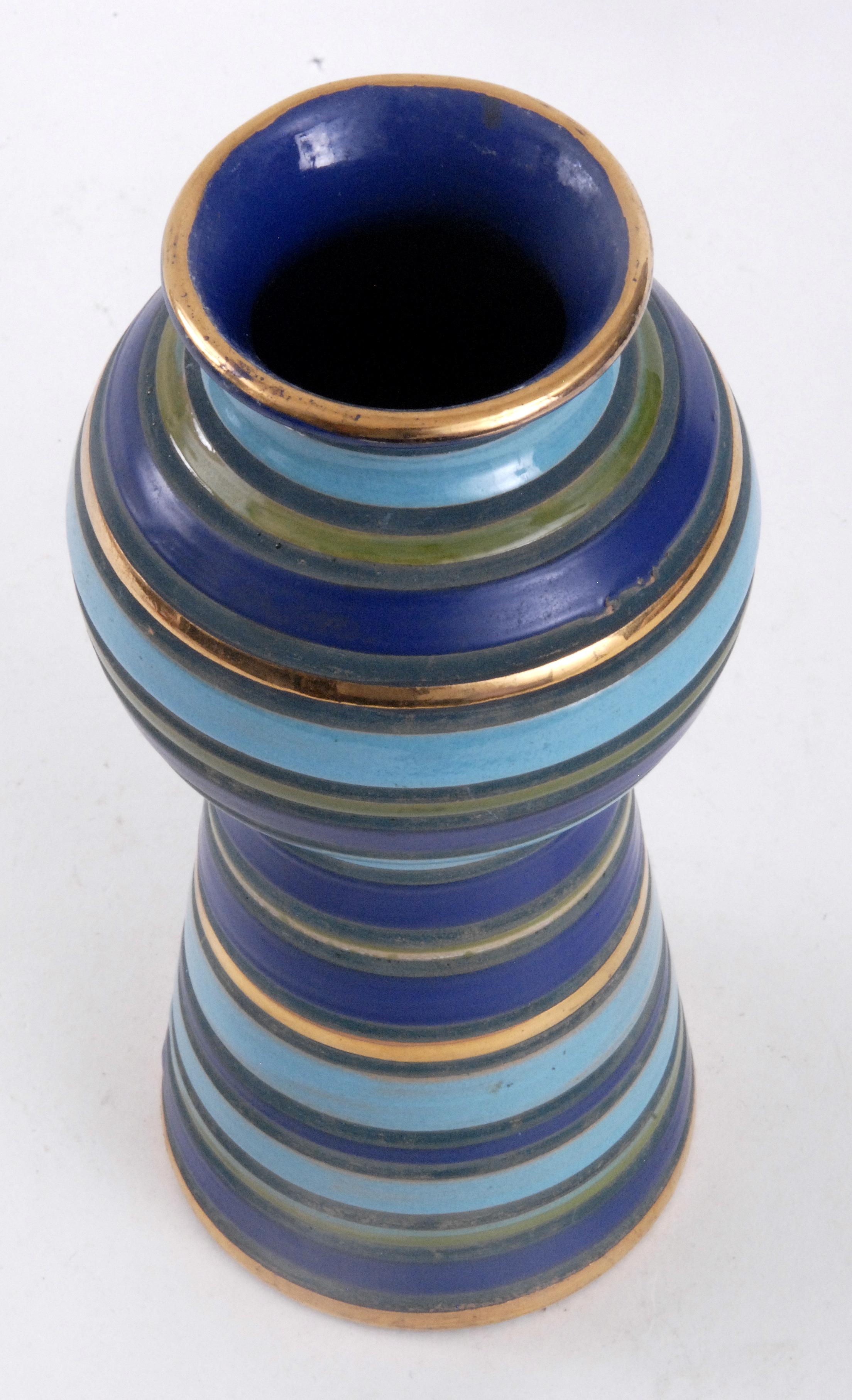 A bright Aldo Londi designed vase with a ball shaped swelling near the top. Acid resist glaze techniques with many colors and gold bands.