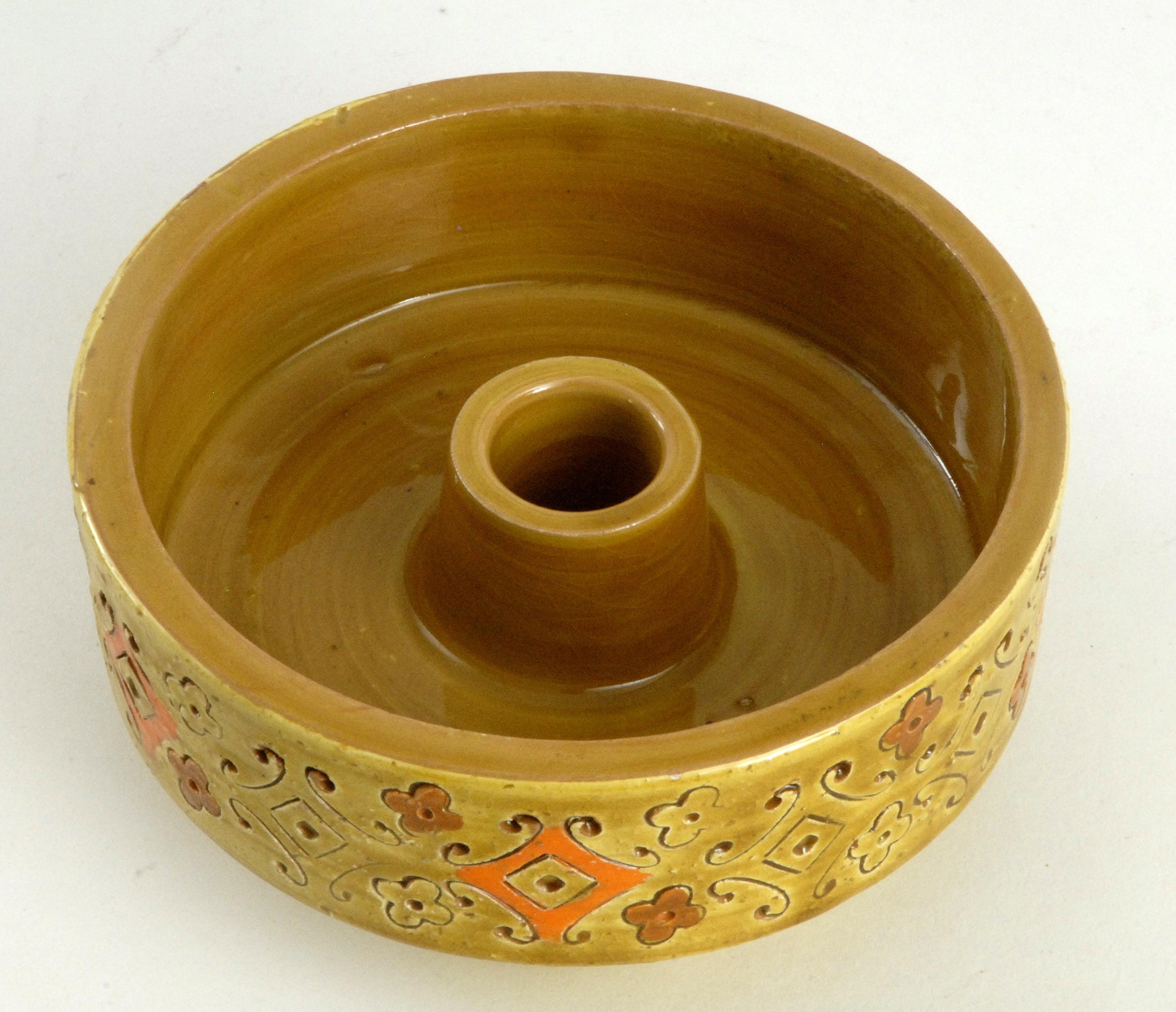 An Aldo Londi designed candleholder with a yellow version of the Spagnoli [Spanish] pattern.