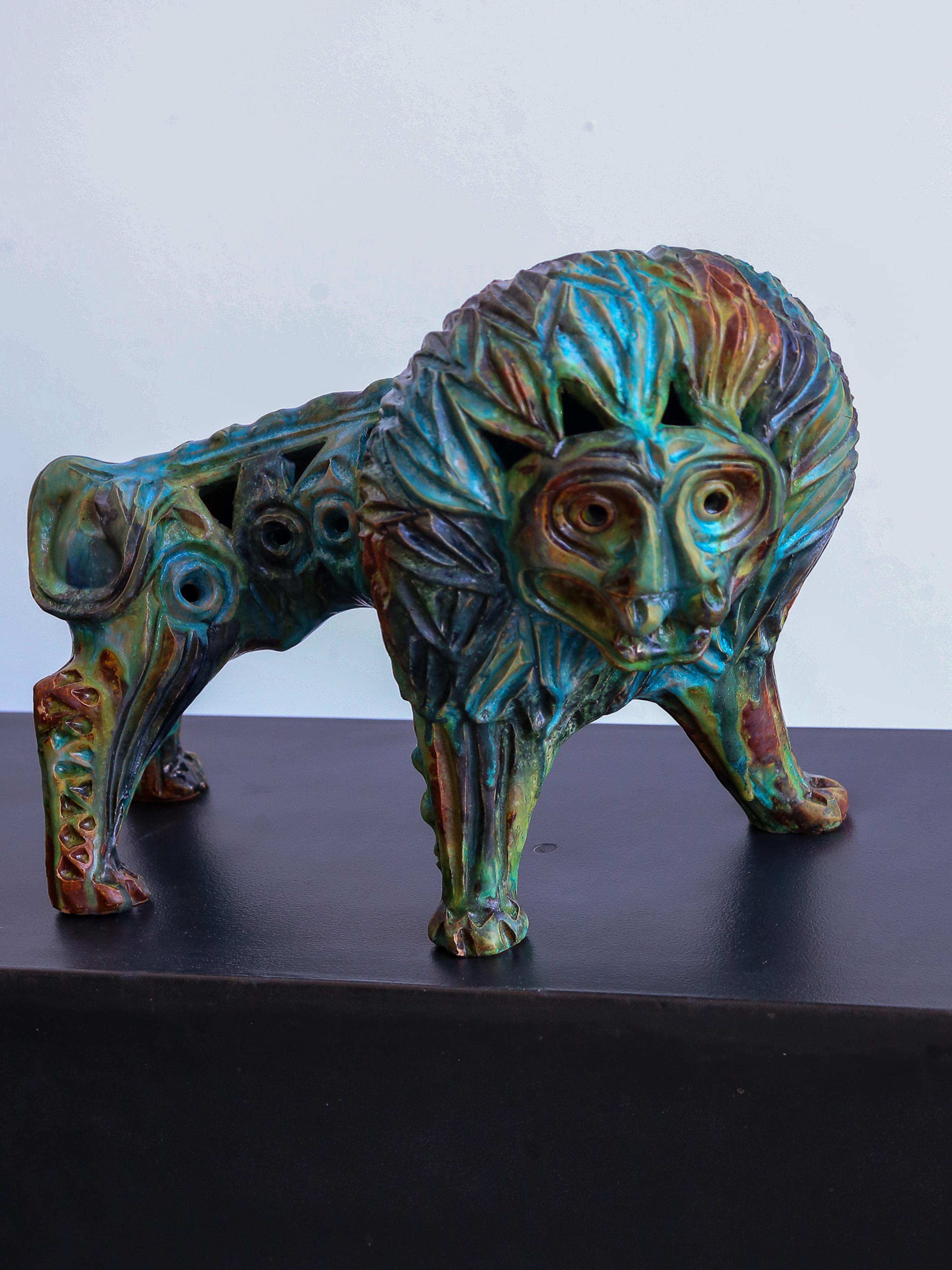 Large Bitossi lion by the famous Alvino Bagni.

Alvino Bagni (1919–2000) was an Italian ceramic artist known for his exquisite work in pottery and ceramics. He was active during the mid-20th century and gained recognition for his remarkable