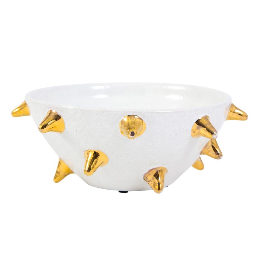 Bitossi bowl, white ceramic gold spikes, signed. Hard to find bowl in small to medium scale bowl glazed in white with gold spikes. Signed on the underside: 95/268 A, Italy. Some minor wear and glaze loss to the gold spikes.