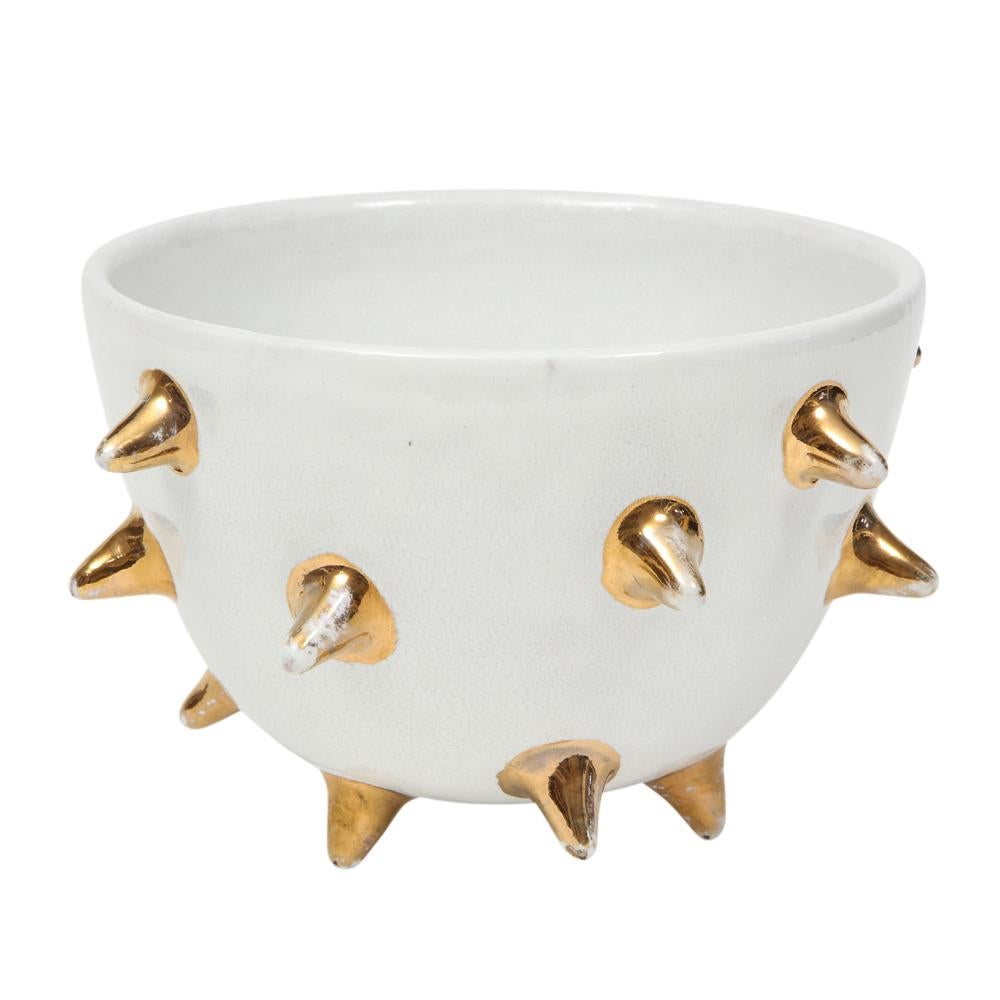 Bitossi bowl, white ceramic, gold spikes, signed. Hard to find medium scale bowl, glazed in white with applied gold spikes. Signed on the underside: 95/269 A, Italy. Some minor wear and glaze loss to the gold spikes.

