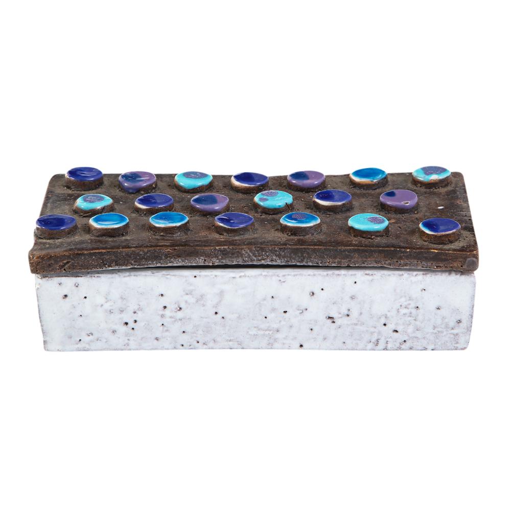 Bitossi box, ceramic, applied discs, blue, purple, white, brown, signed. The lid is a coarse dark chocolate clay decorated with rows of applied glazed discs in violet (purple) and blues. Box is glazed in white and is signed on the underside: 871