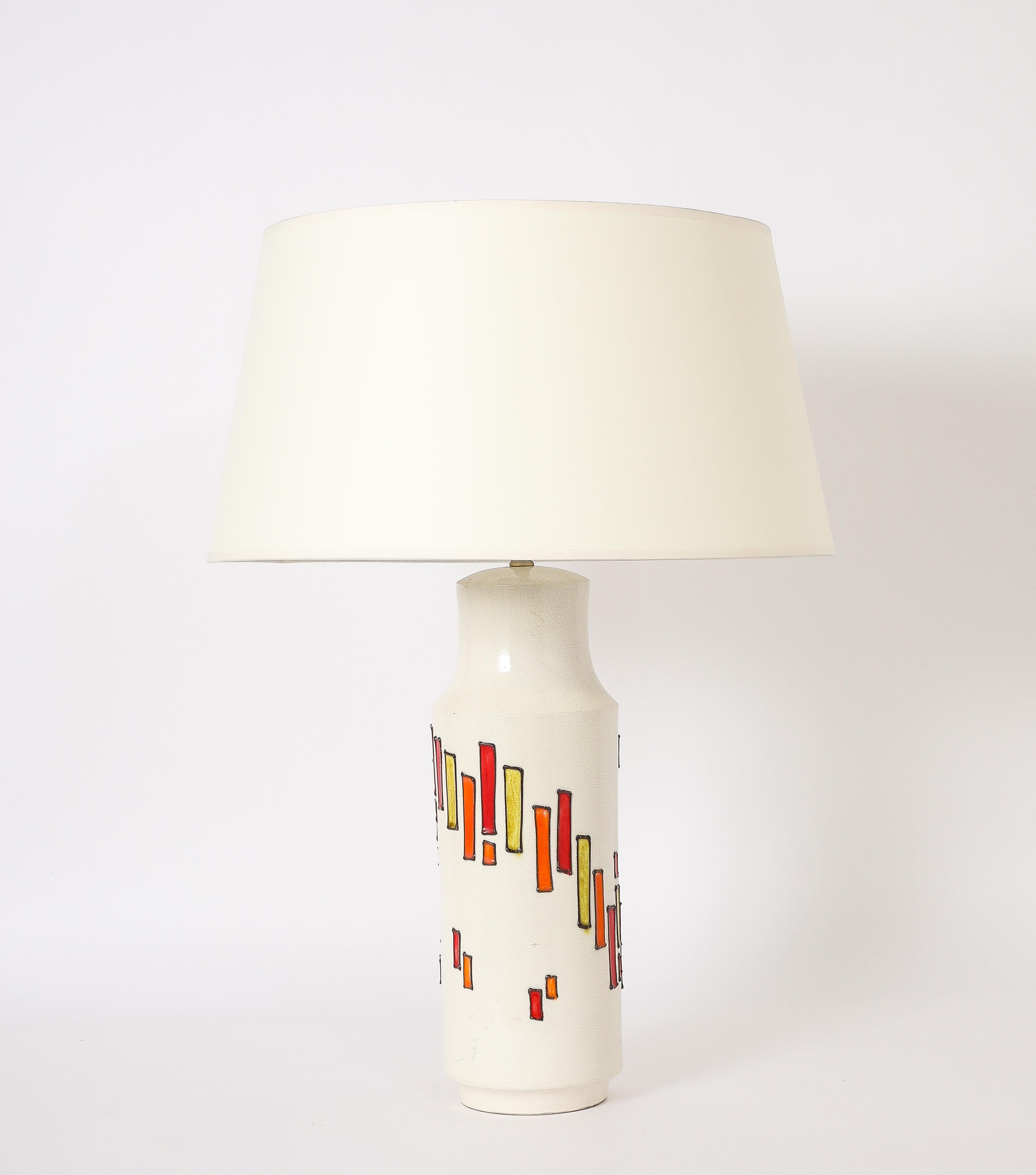 Grande lampe de table à gradins en céramique craquelée avec des motifs orange et jaune en verre fusionné.

Base seule 18x7