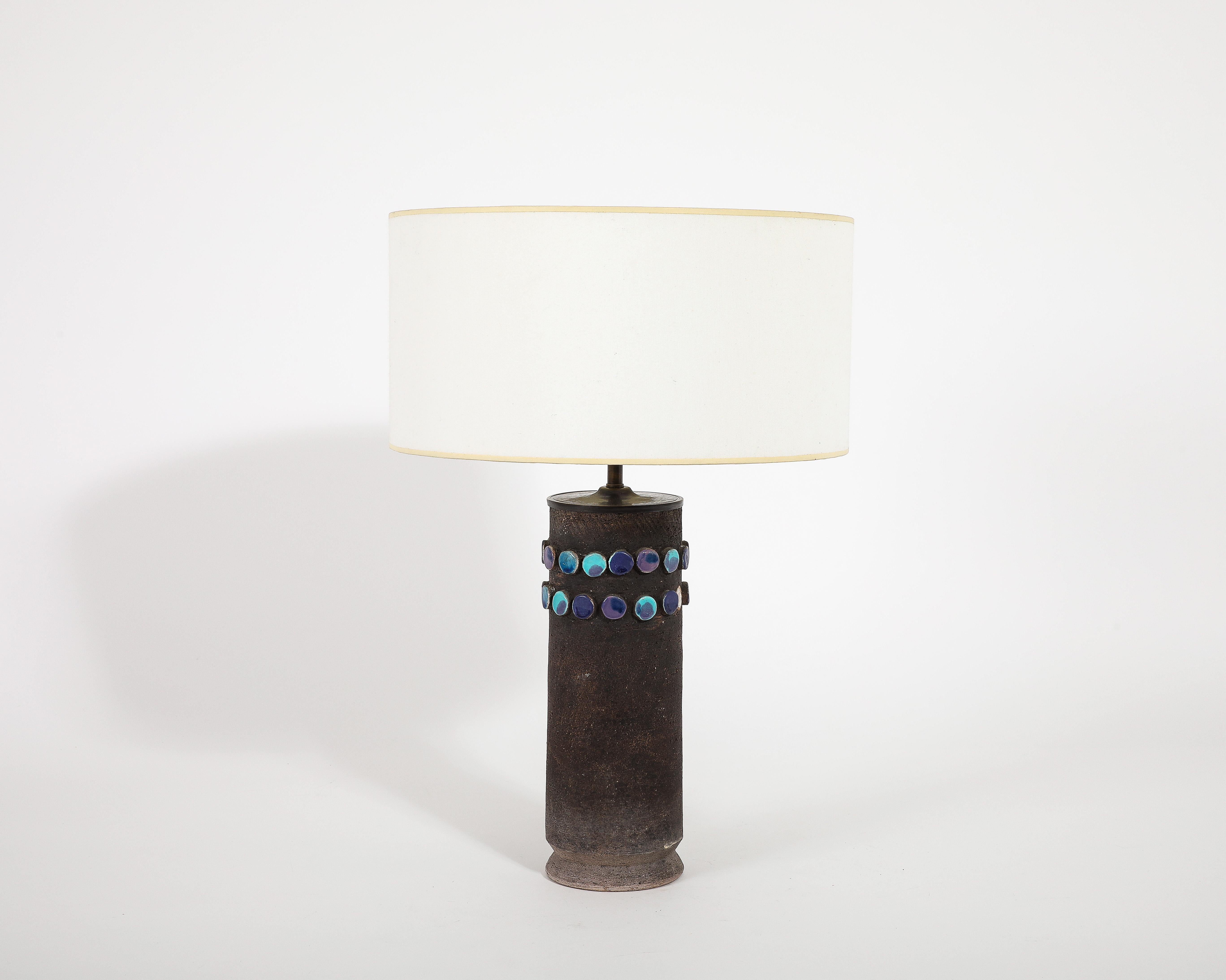 A rare Aldo Londi for Bitossi table lamp in raw earthenware augmented with ceramic dots glazed in varying shades of blue. 
