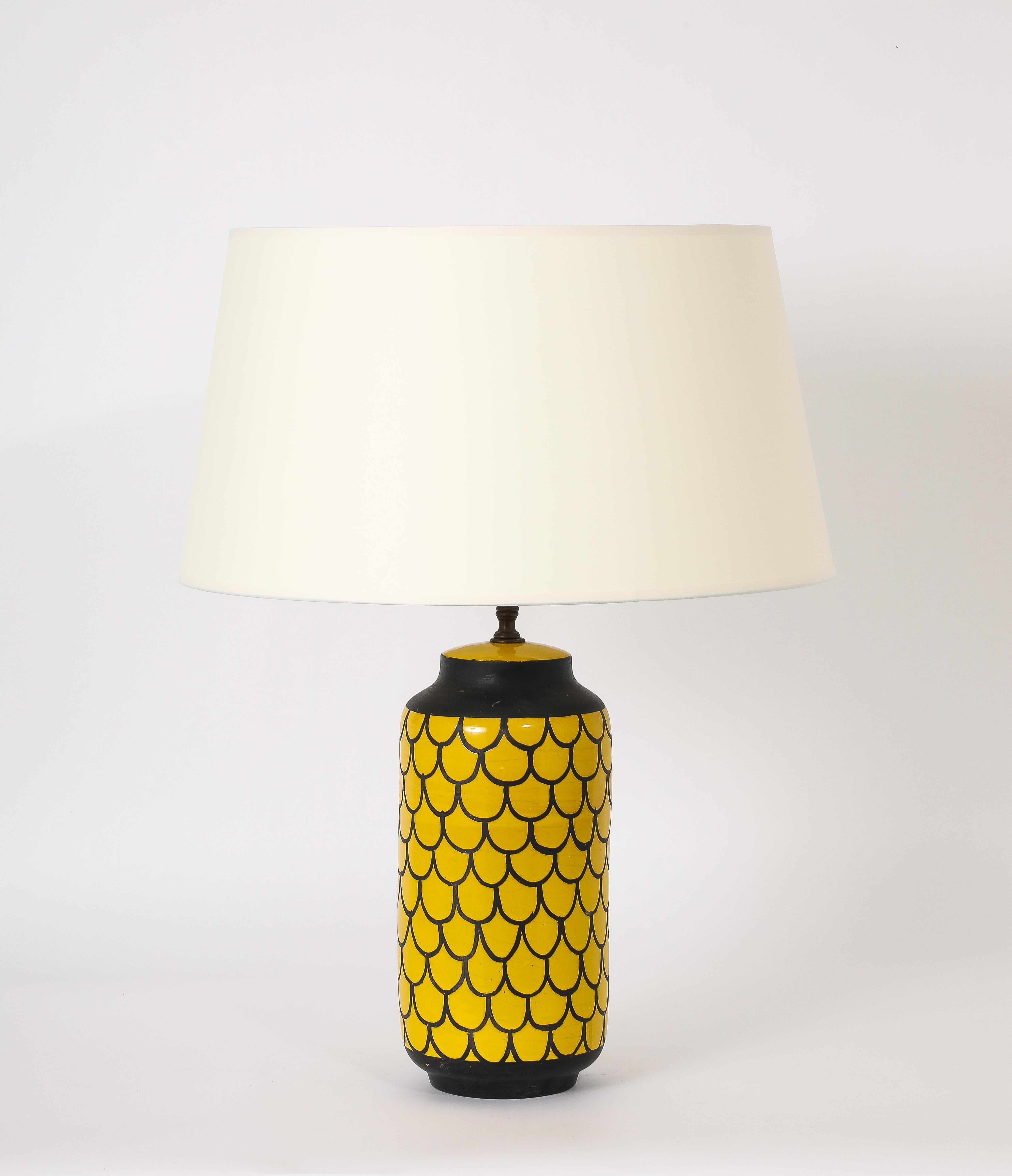 Large lamp in matte brown glaze augmented with a vivid yellow enameled abstract pattern. Size of base only, wired.