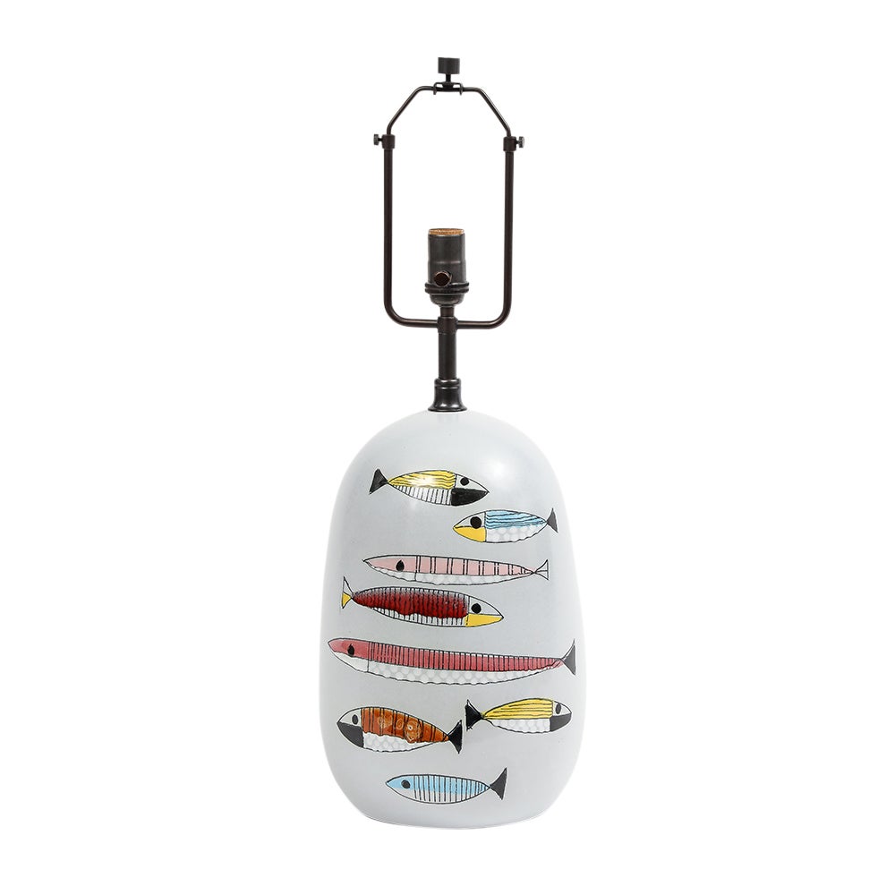 Bitossi Fish Table Lamp, Ceramic, Red, Yellow, Blue Signed. Medium scale table lamp decorated with glazed fish (in colors) over a grayish off-white rounded body. Marked: B 46. Italy on bottom of ceramic. Ceramic only measures: 14.5 inches. 21 inches