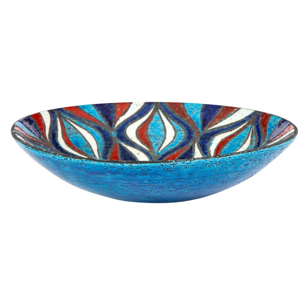 Bitossi for Rosenthal Netter bowl, ceramic, blue red, white, onion pattern. Large scale colorful ceramic bowl with a Rimini blue exterior and a wavy abstract onion pattern interior glazed in navy, red, and white.