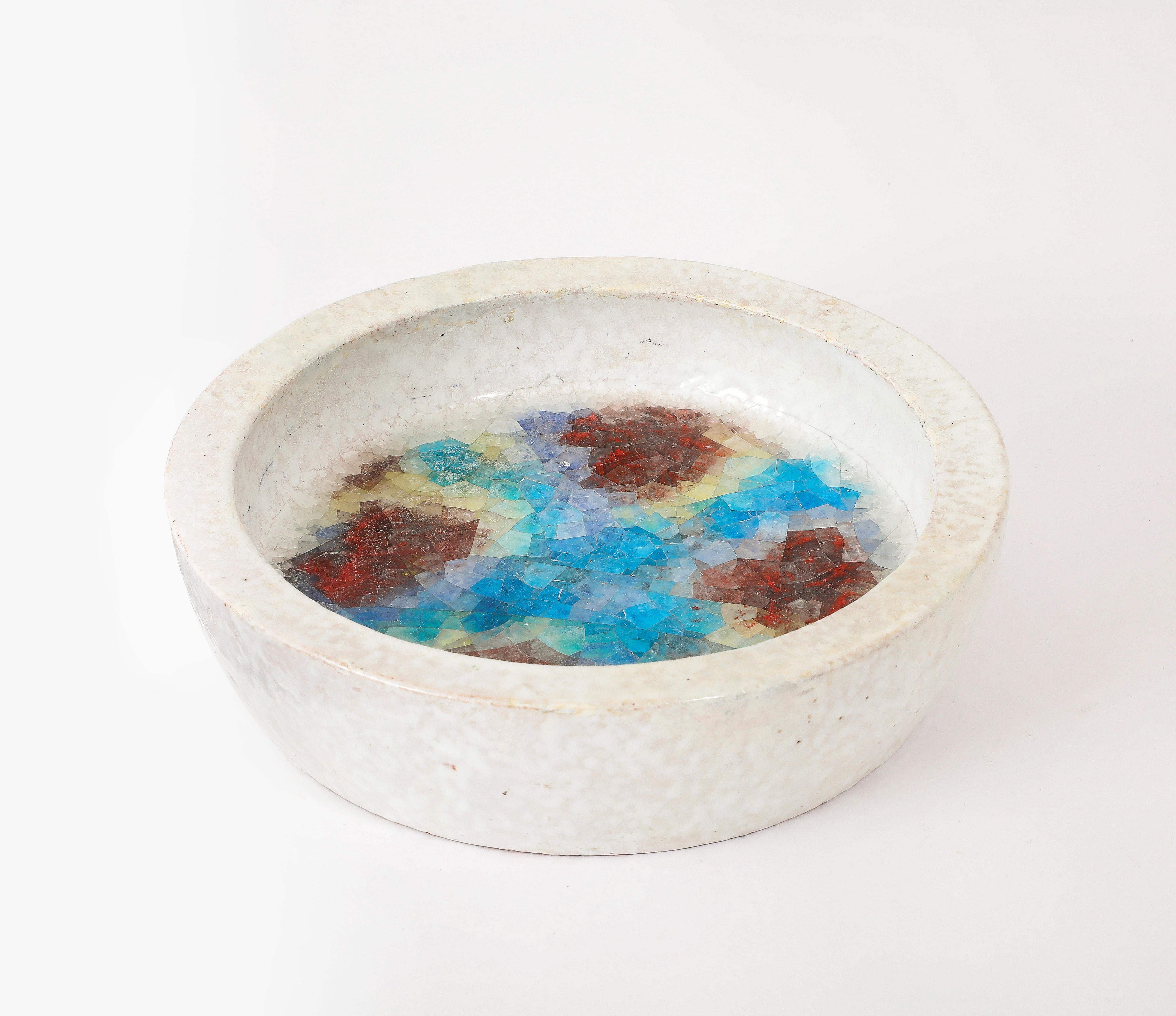 Exceptionally large and thick-walled Bitossi “fritte” bowl, the bottom filled with gem-like fused glass. 