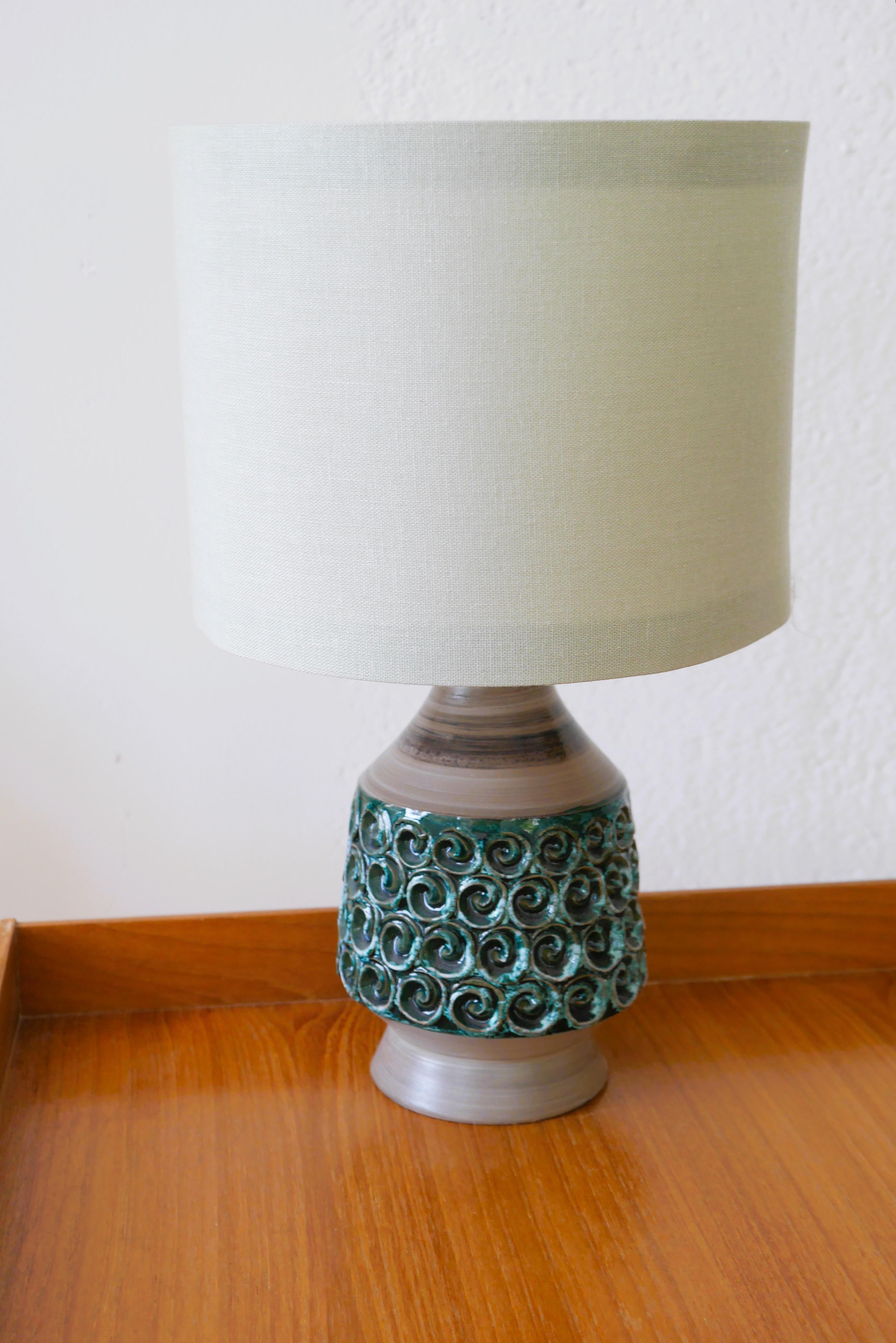A beautiful handmade ceramic lamp base from Bitossi, Italy. This is very adorable little lamp which has very muted colours, with a warm pale brown base with green details in the middle section, which gives it a contemporary feeling. It is 24cm