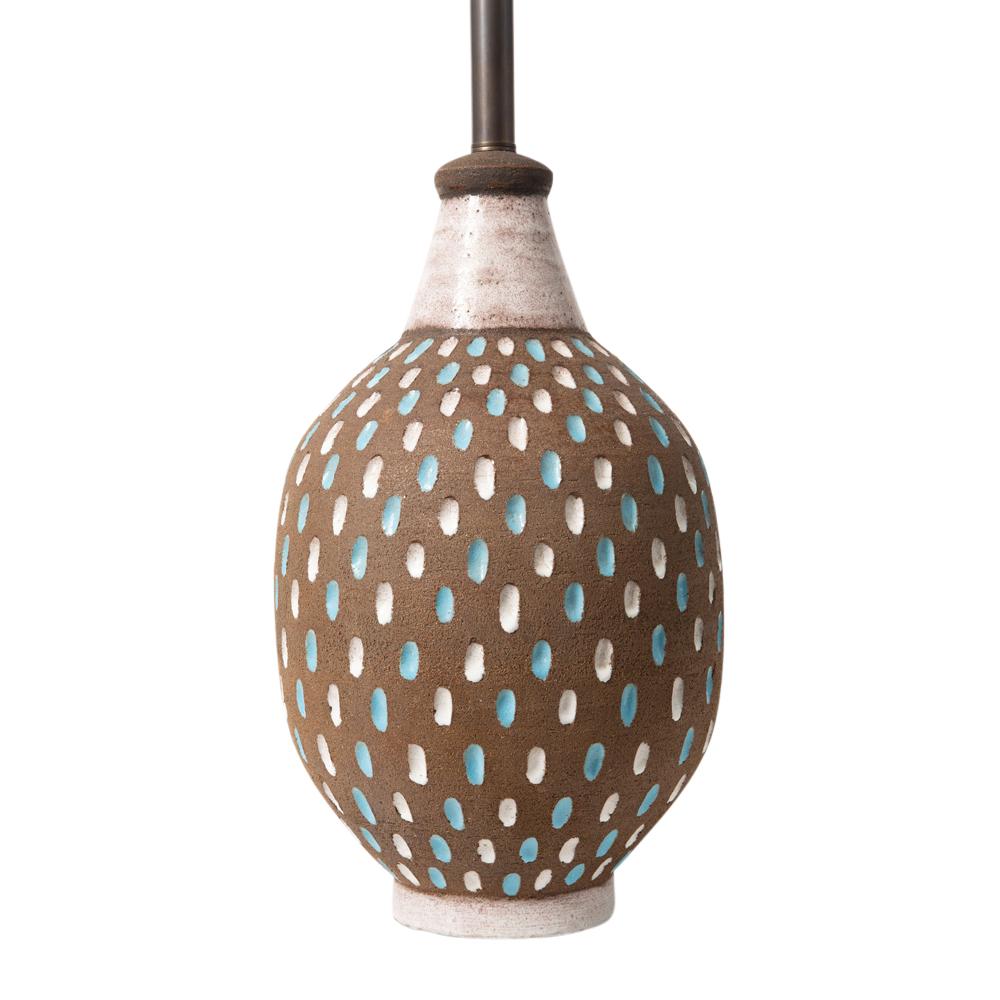 Bitossi table lamp, ceramic, brown, white, blue speckles, signed. Large scale table lamp with a raw brown clay body decorated with a pattern of impressed glazed ovals in Robin egg blue and white. Shade not included in sale but measures: 13.25