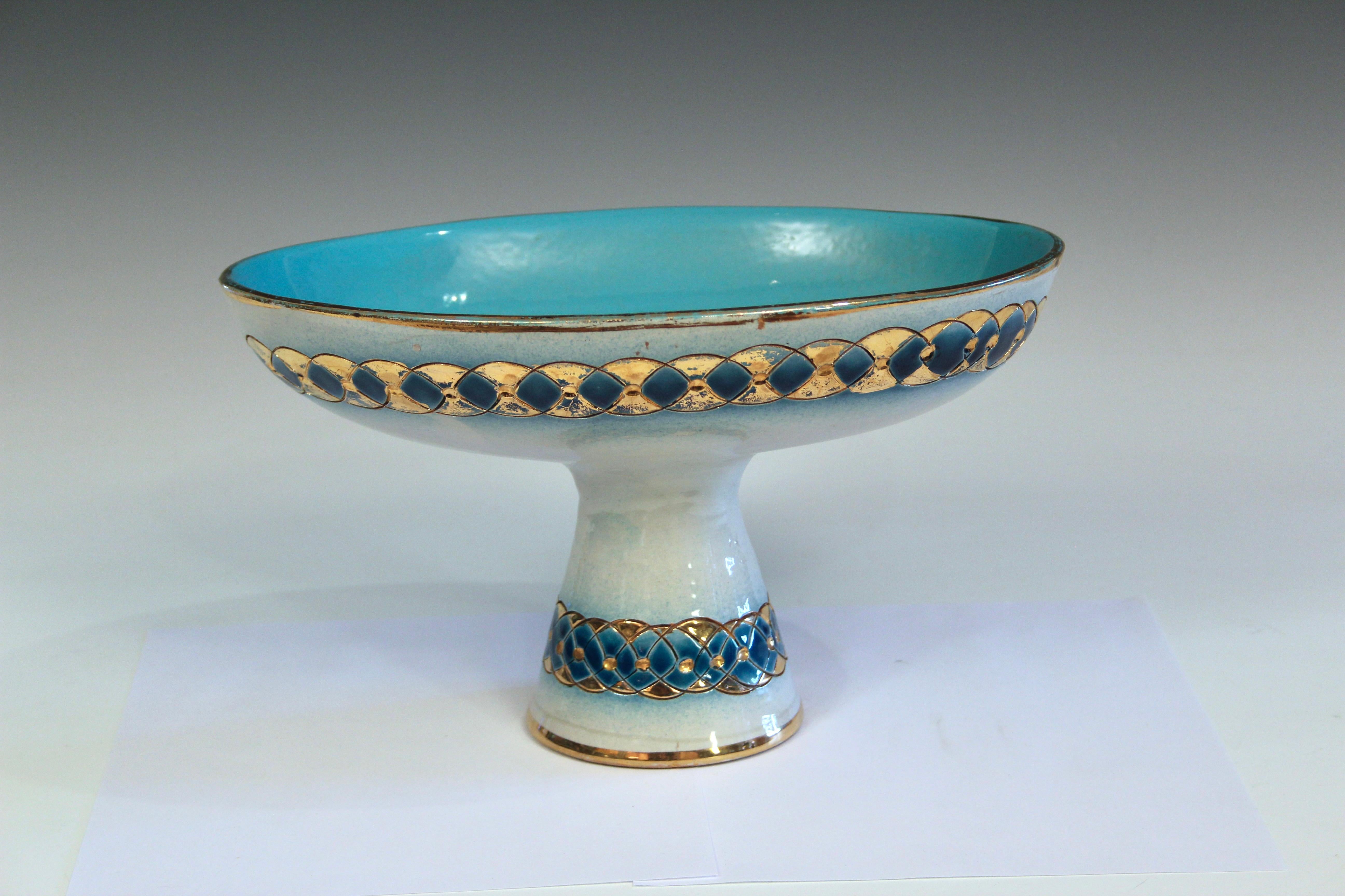 Stylish Bitossi pottery compote in blue and white and gold with impressed bands of overlapping geometrics. Circa 1960's. 12