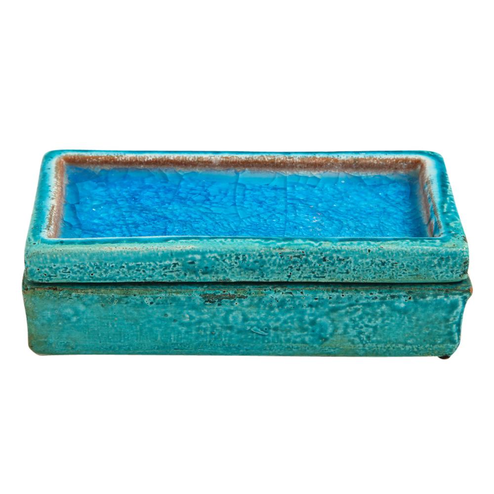 Bitossi box, ceramic blue fused glass signed. Turquoise glazed lidded box with blue fused glass inset top. In good condition with minor wear to the edges and a few minute flakes to the ceramic. Signed 1014 Italy on the underside of the bottom of the