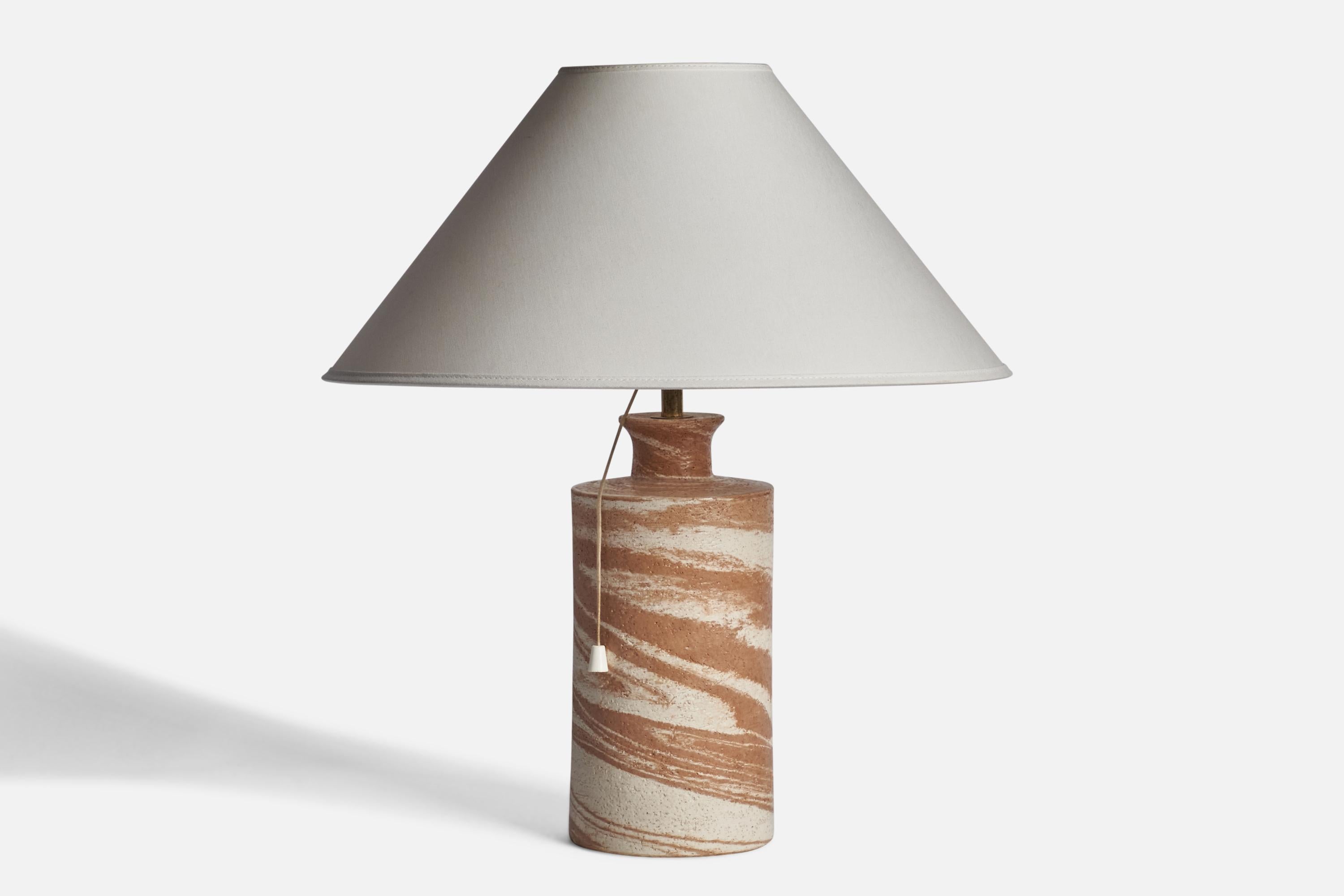 A pink and off-white glazed stoneware table lamp designed and produced by Bitossi, Sweden, 1960s.

Dimensions of Lamp (inches): 13.25” H x 4.75” Diameter
Dimensions of Shade (inches): 4.5” Top Diameter x 16” Bottom Diameter x 7.25” H
Dimensions of