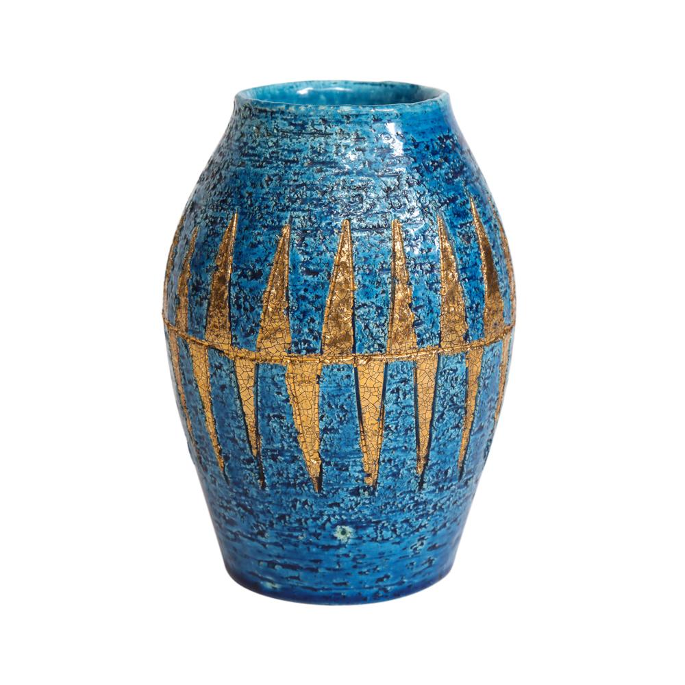Bitossi vase, ceramic, blue and gold, geometric, signed. Small scale tapered vase decorated with a gold glazed diamond pattern over a Rimini blue glazed body. Signed on the underside: Italy. Photos 2 and 3 show a pinhole size discoloration to the