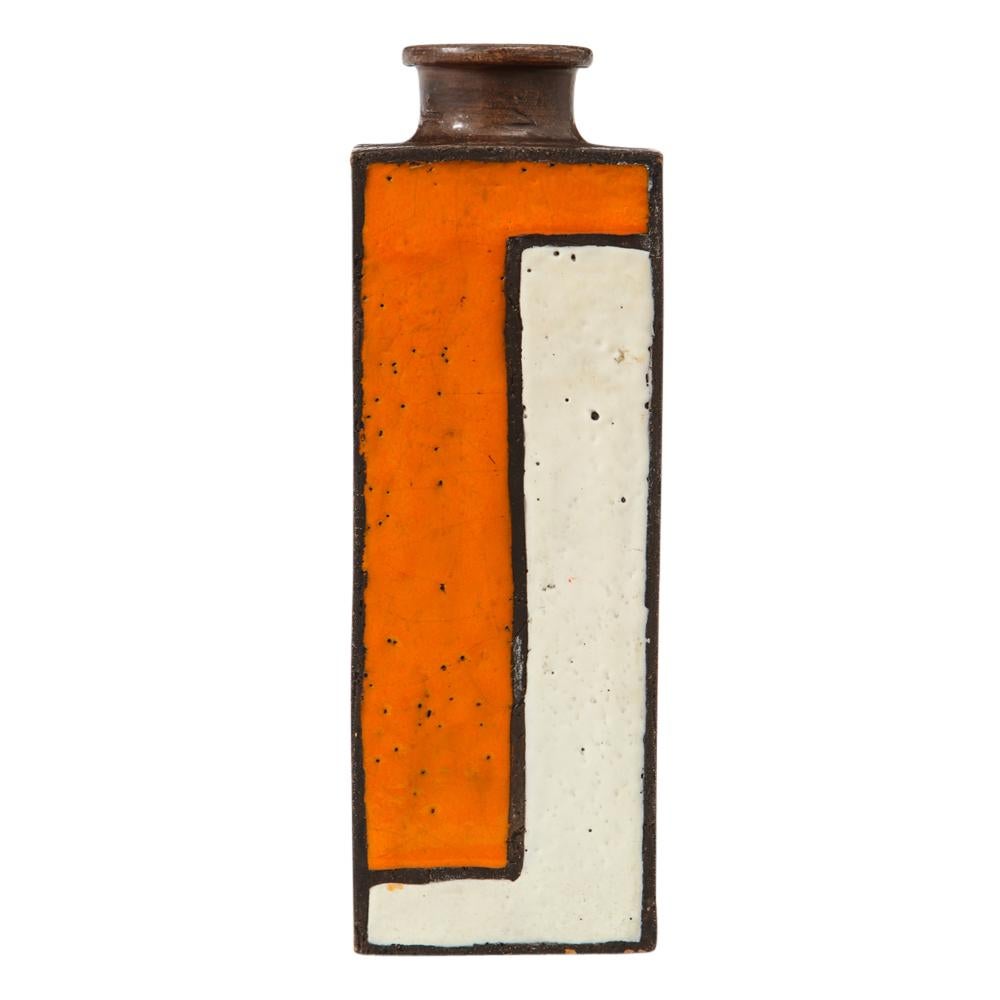 Bitossi vase, ceramic, orange, brown and white, Mondrian, geometric, signed. Medium scale elongated cube form vase decorated with a Mondrian style geometric pattern of orange and white over a coarse brown clay body. The underside retains two made in