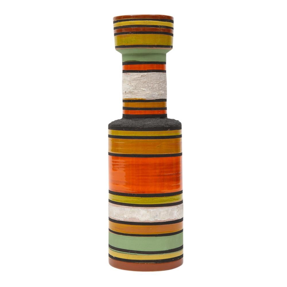 Bitossi vase, ceramic, stripes, orange, yellow, white, signed. Medium scale vase, with modernist form, glazed in orange, matte white, black, chartreuse yellow, mint green, and caramel stripes. A fine example from Aldo Londi's Thailandia Series, in