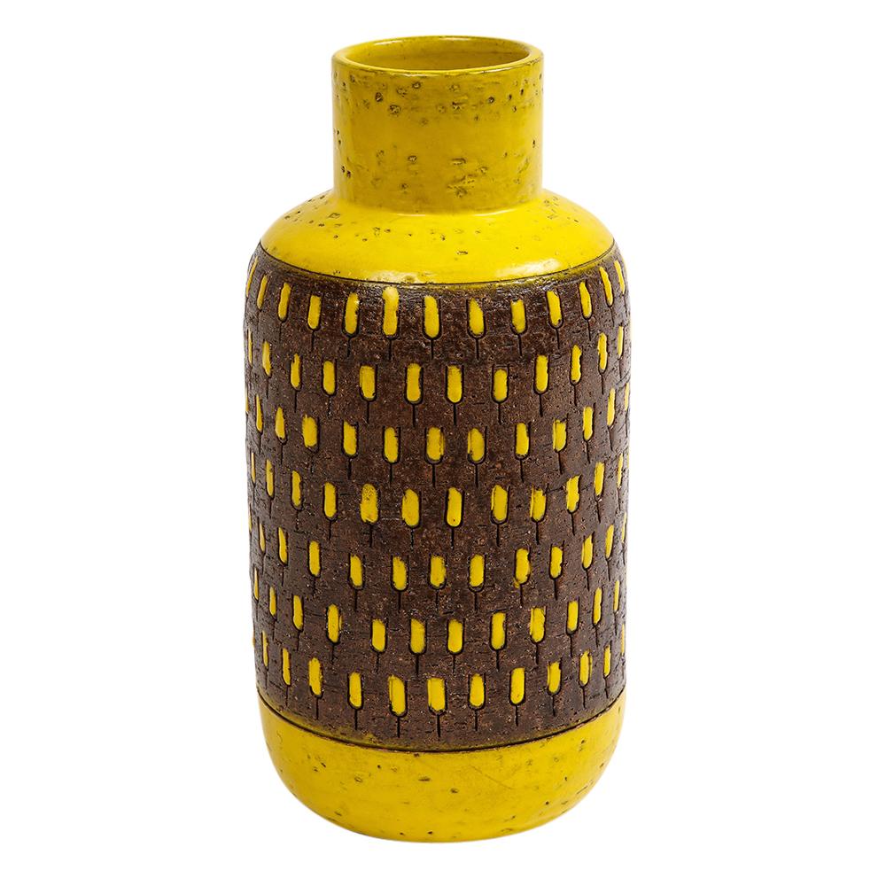 Bitossi vase, ceramic, yellow, brown, signed. Medium scale chunky vase glazed in yellow and coarse matte brown clay body and decorated with a pattern of yellow incised pill shape forms. Signed on the underside: 