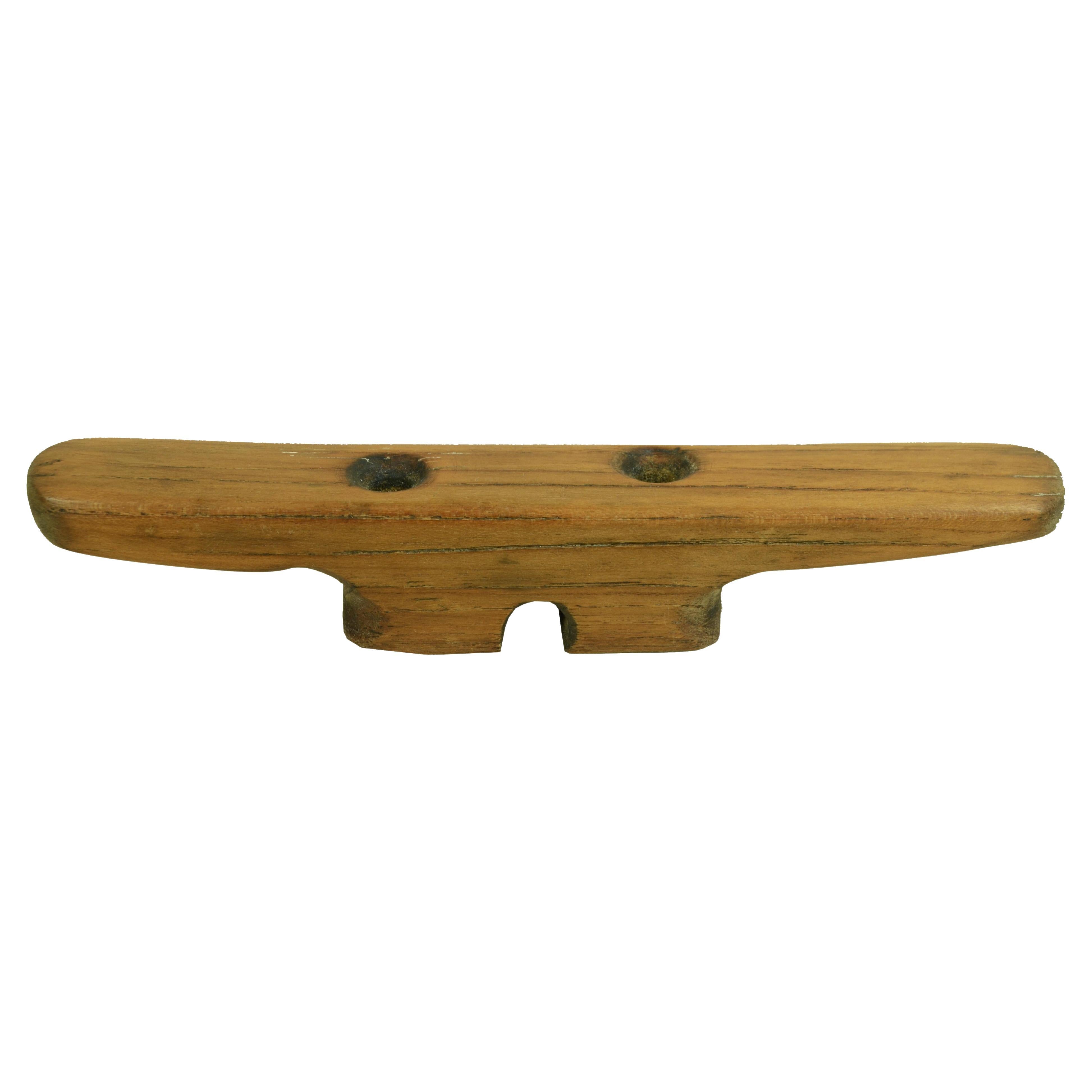 Early 20th century mahogany bollard with a pi shape used to stop a line