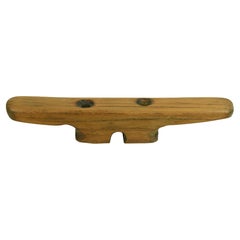 Early 20th century mahogany bollard with a pi shape used to stop a line