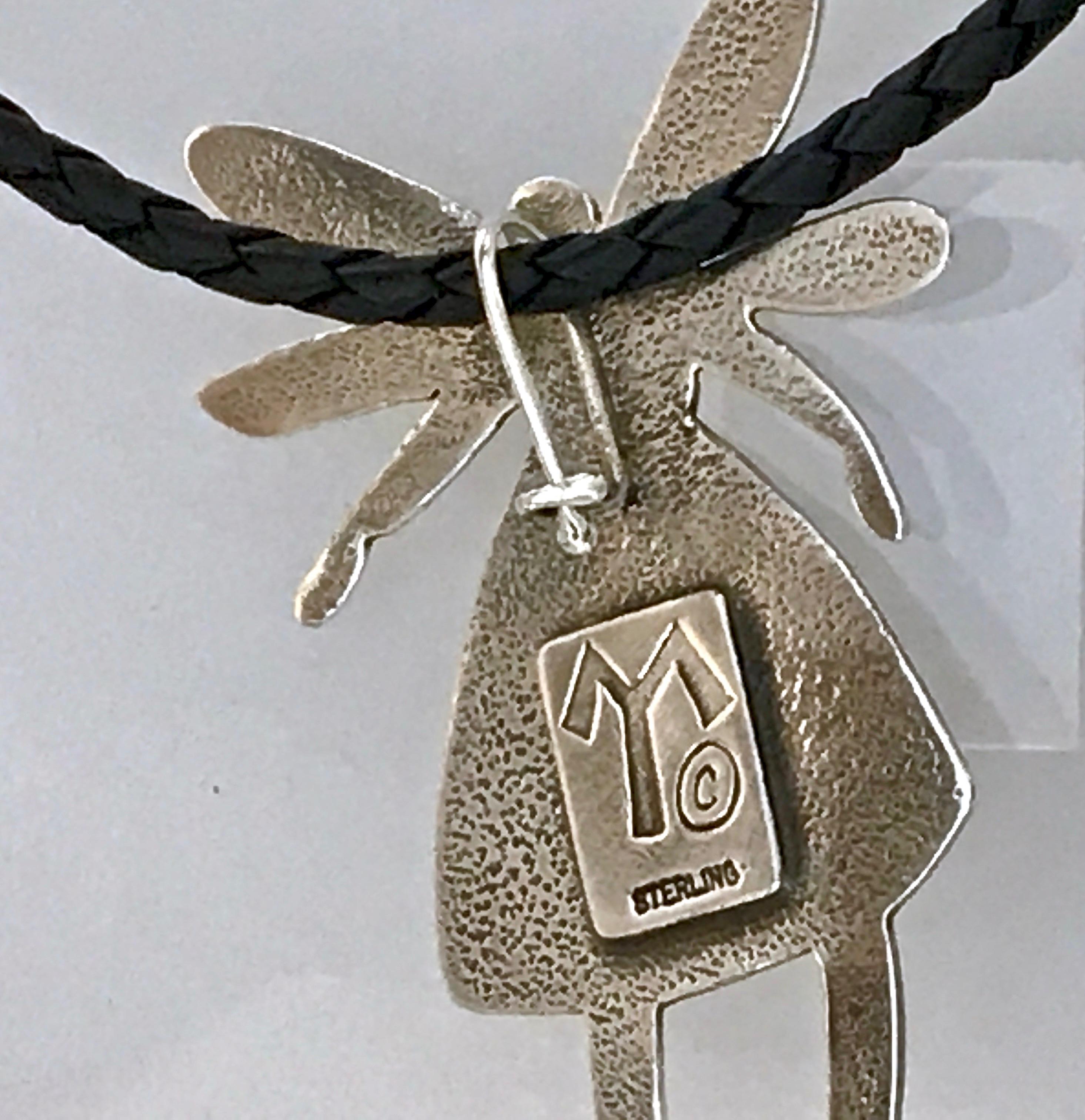 Melanie A. Yazzie ™: jewelry
BITTER WATER GIRL
cast sterling silver enhancer
3” h x 2” w

Pendant/enhancer cast sterling silver. Gently slide the enhancer over beads or a cord of your own. Beads and cords shown in the images are for sale separately.