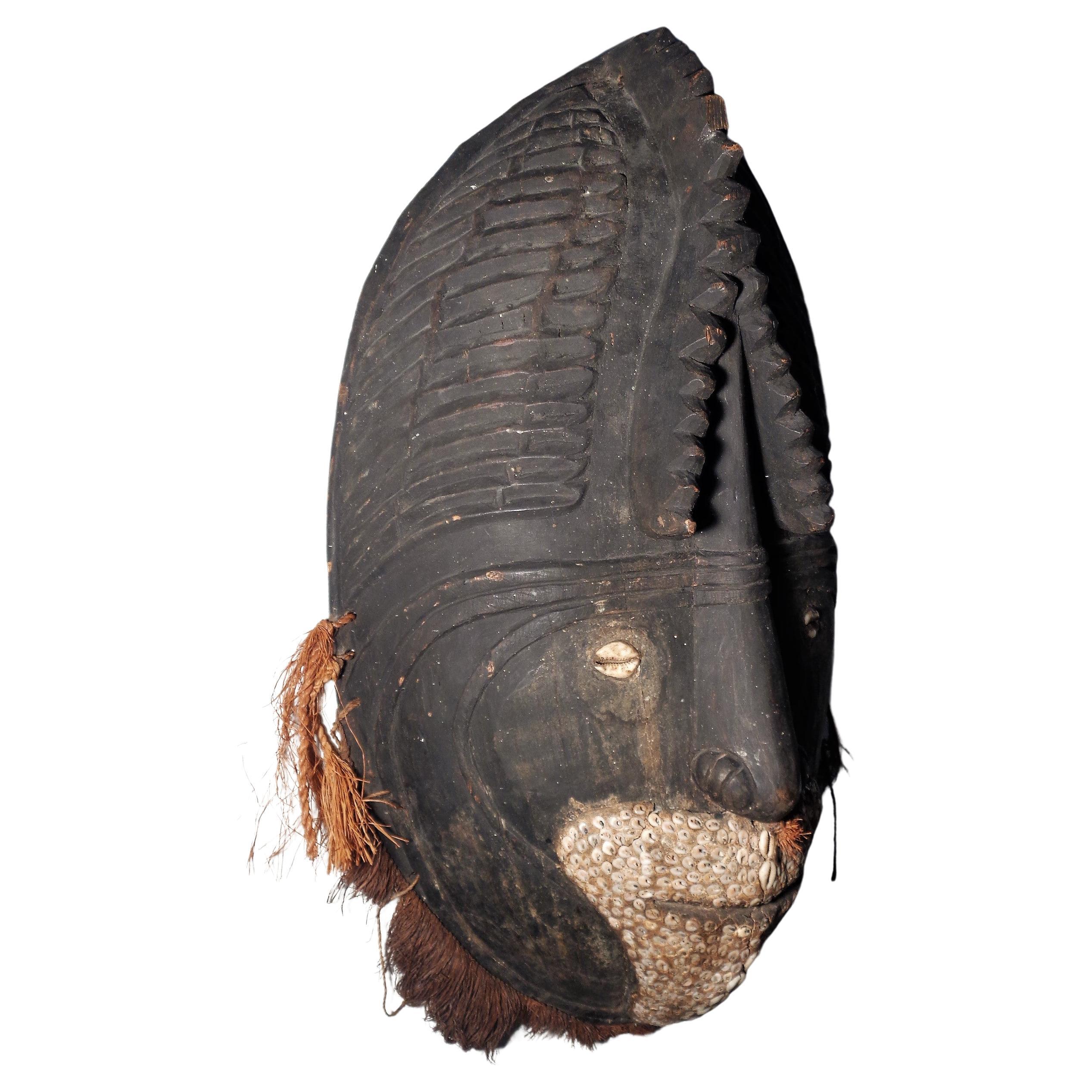Biwat people mask from the Yuat river region middle Sepik river Papua New Guinea in nicely aged original rich surface color patina to wood, shells and natural fibers. Circa 1980. Look at all pictures and read condition report in comment section.