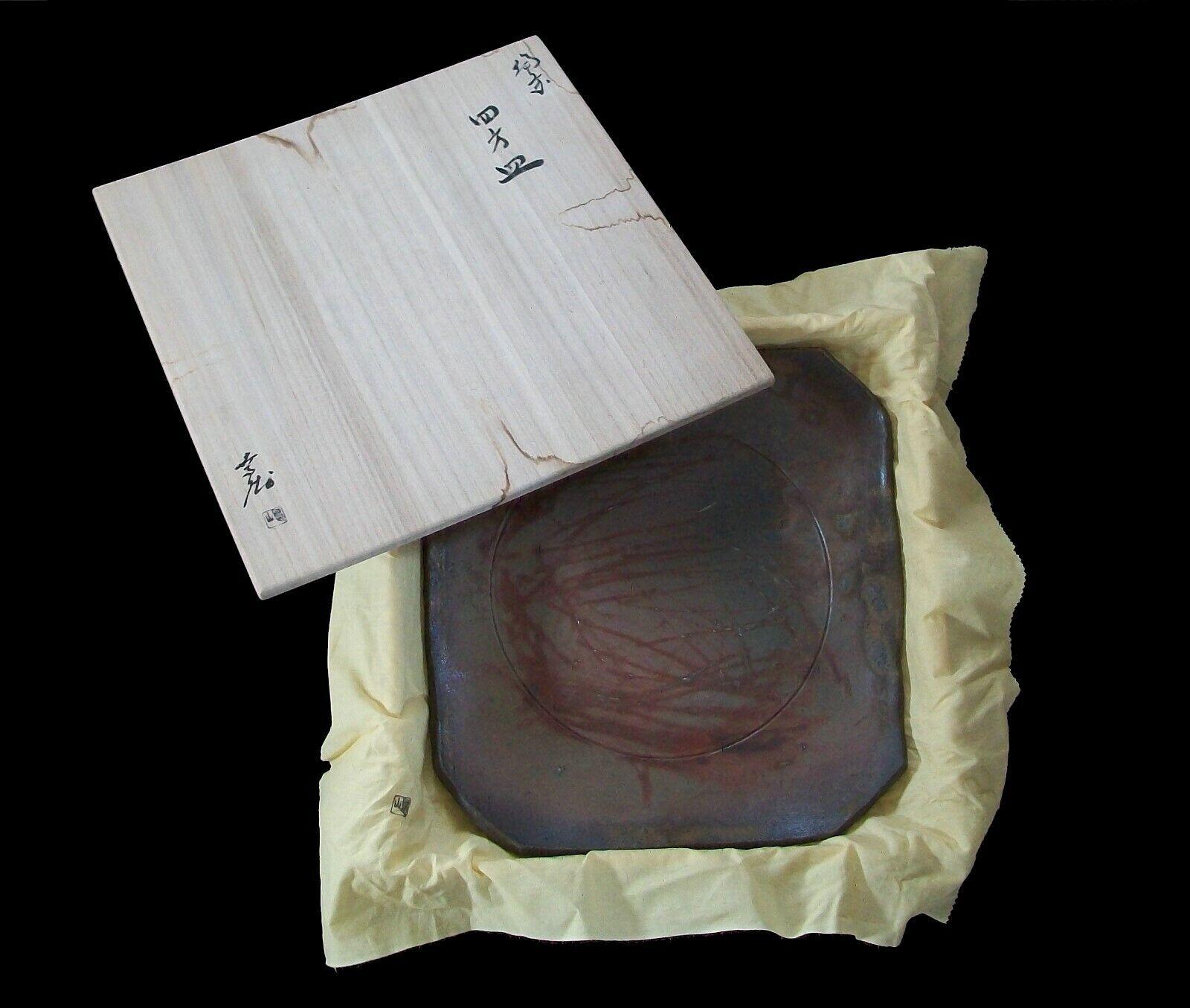 Bizen ware studio pottery 'wood fired' charger - impressive size - slightly irregular shape but presents itself as square - scored central circle and base - smoke and flame licked surface - contained in the original signed cedar presentation box and