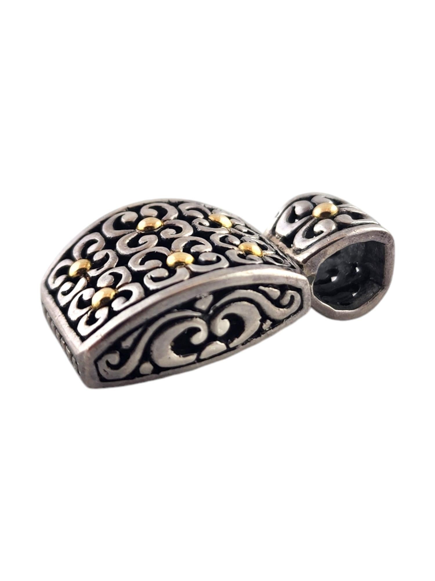 BJC Samuel Benham Sterling Silver & 18K Yellow Gold Pendant

This gorgeous pendant by designer Samuel Benham was meticulously crafted from sterling silver with 18K yellow gold detailing!

Size: 32.7mm X 19.05mm X 8.40mm

Weight: 11.37 g/ 7.31