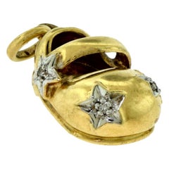 Piccolo ciondolo con diamante in oro giallo firmato BJC