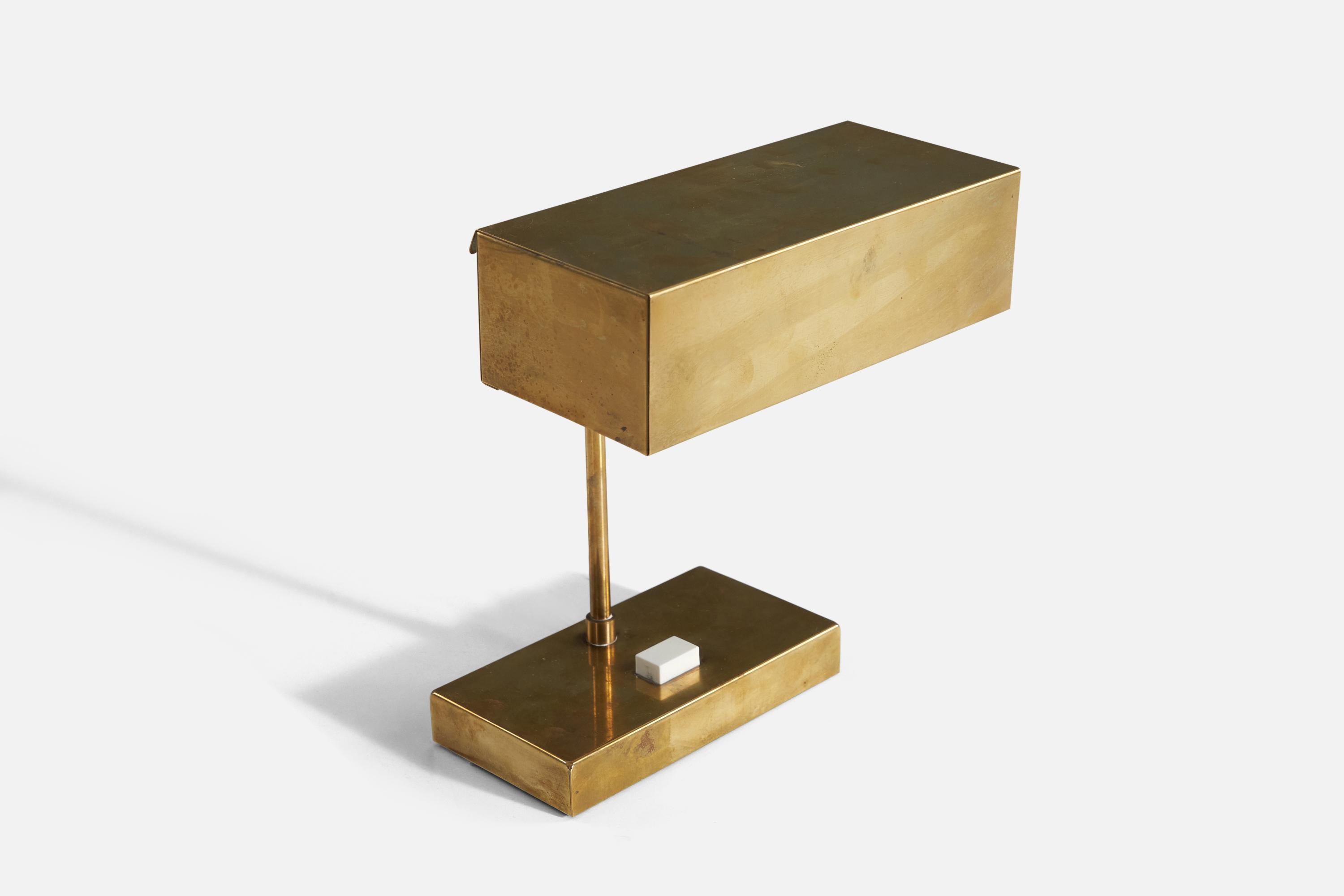 A Minimalist “Elidus” table lamp / desk light in brass, design attributed to Björn Svensson. Produced in Sweden, 1970s. 

Previously believed to have been designed by Hans-Agne Jakobsson.

 