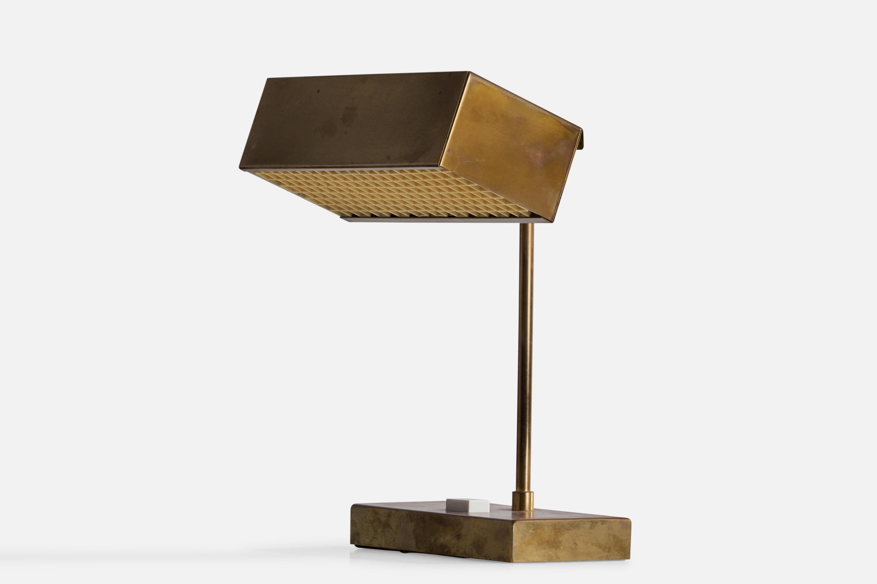An adjustable brass and acrylic “Elidus” Table Lamp designed by Björn Svensson, Sweden, 1970s.

Overall Dimensions (inches): 11.25”  H x 8.25”  W x 7”  D
Stated dimensions include shade.
Bulb Specifications: E-14 Bulb
Number of Sockets: 1
All