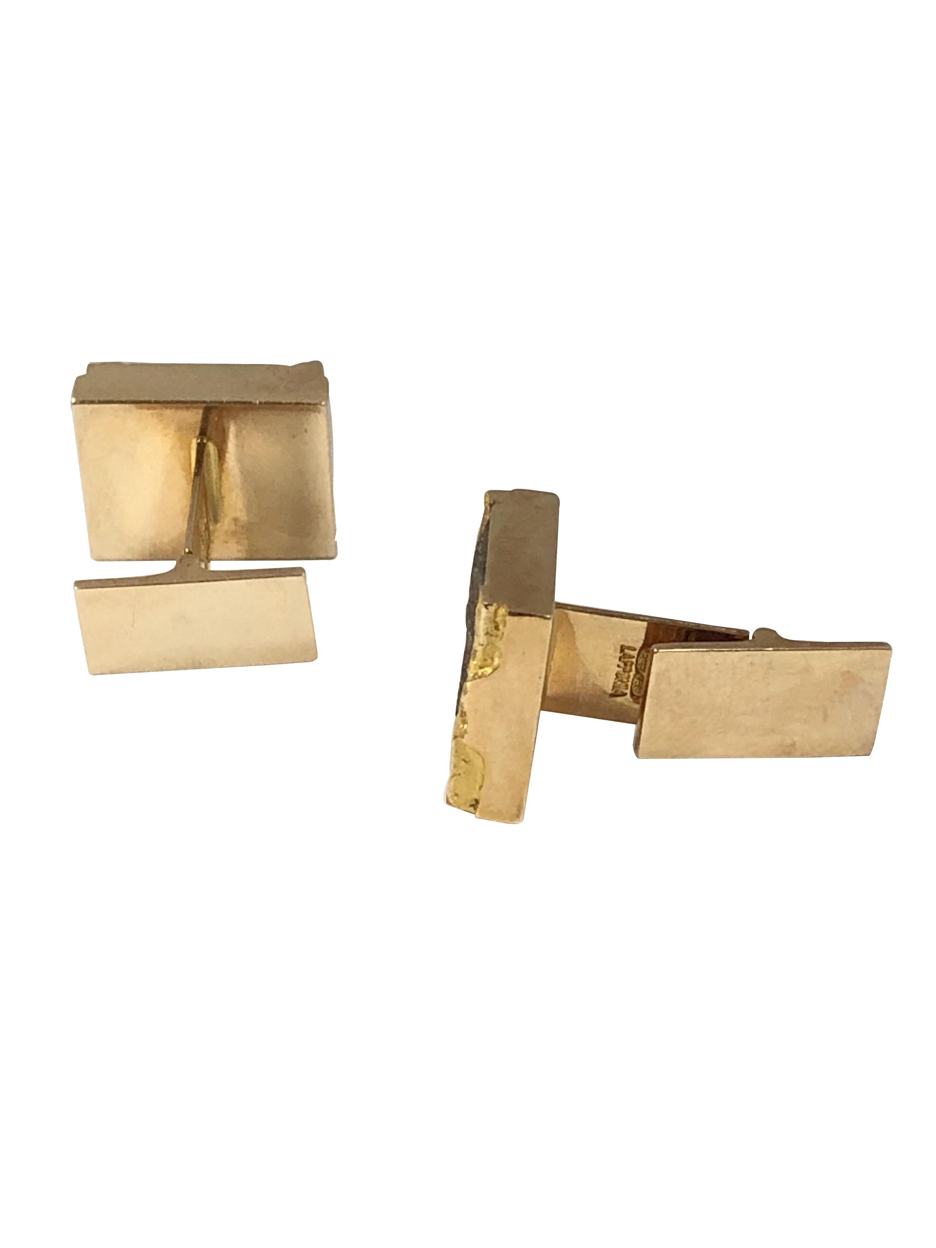 Circa 1980s Bjorn Weckstrom for Lapponia 14k Yellow Gold Modernist designed Cufflinks, the tops measure 5/8 x 1/2 inch and centrally set with a Brownish Gray Calcite stone. Toggle Backs for easy on and off. 