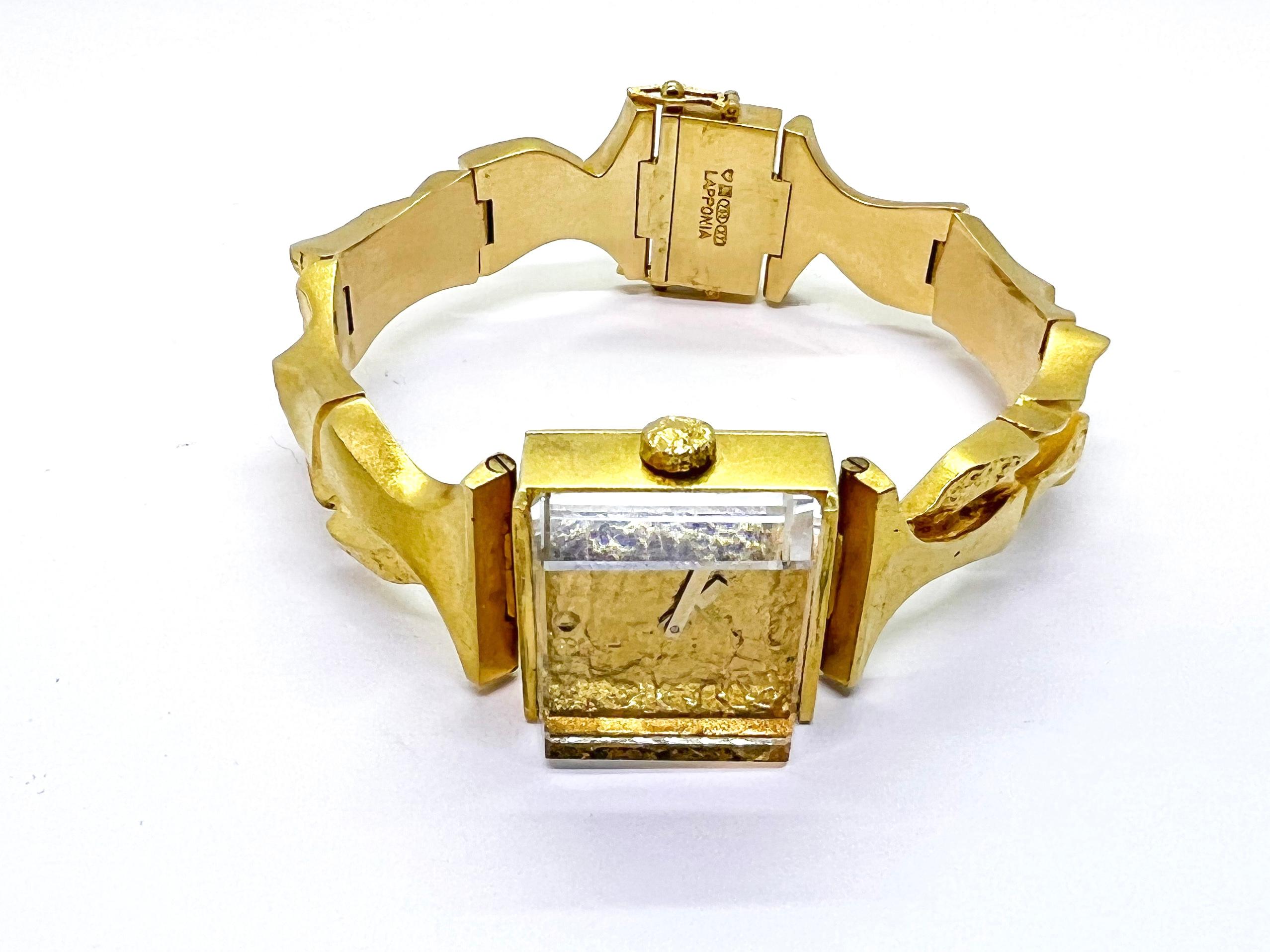 Björn Weckströn Lapponia Wristwatch 18 Karat Gold Super Rare Time Adviser, =Tiedonantaja

Size
17,5cm. 69,3g
Gold watch designed by Björn Weckström for Lapponia. Signed LAPPONIA
rare and heavy wristwatch from Lapponia, case and bracelet in solid