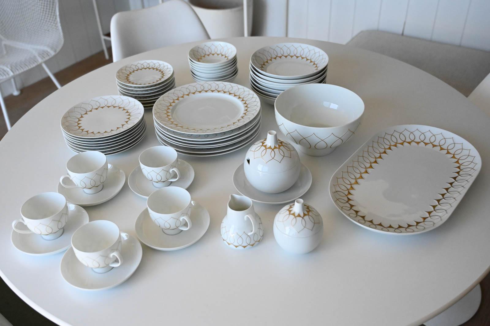 Bjorn Wiinblad for Rosenthal Gold Lotus Silhouette Tableware, Service for 8.  Beautiful set of service for 8 includes:

7 Dinner Plates
8 Salad Plates
8 Bread/Dessert Plates
8 Large Soup/Salad Bowls
8 Small Soup Bowls
1 Large Serving Bowl
1 Large