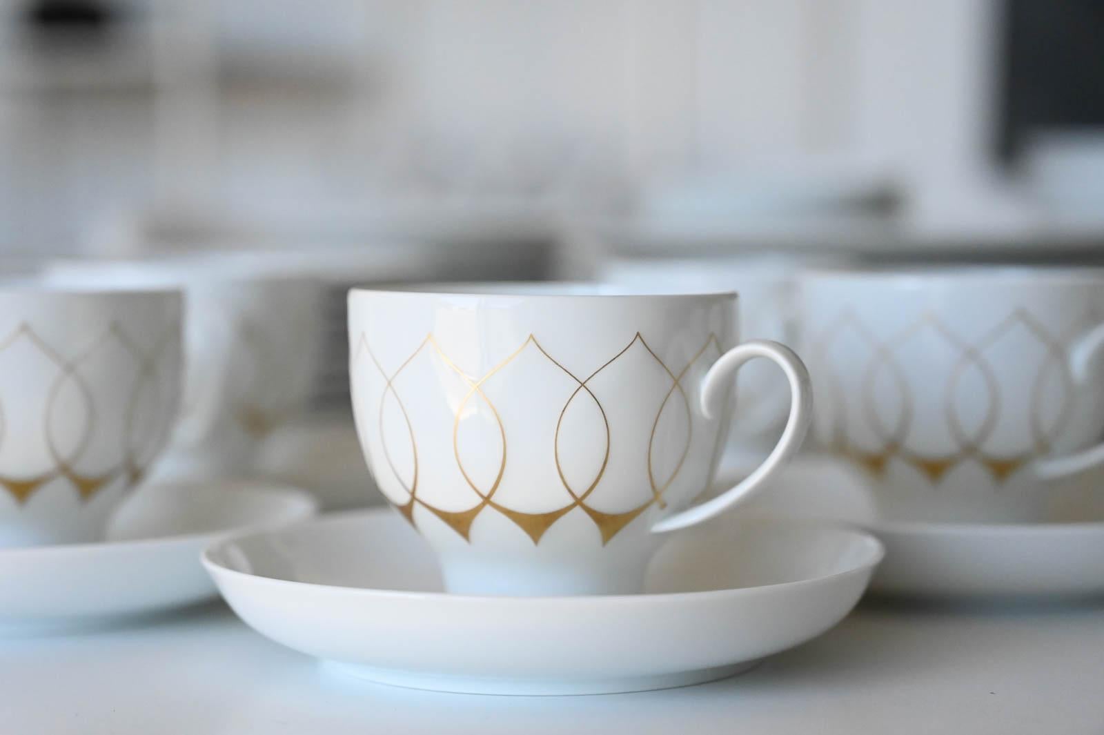 Porcelain Bjorn Wiinblad for Rosenthal Gold Lotus Silhouette Tableware, Service for 8 For Sale