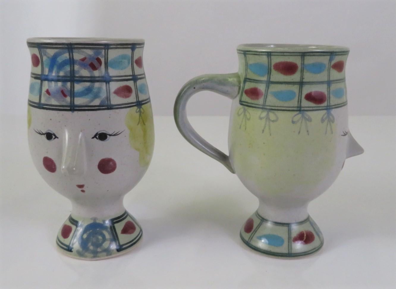 In the decorative style of Bjorn Wiinblad, here are five handled mugs for coffee, expresso, hot chocolate or any beverage with the stylized heads and faces so associated with Wiinblad. No signature on bottom but have seen the same mugs with the Fitz