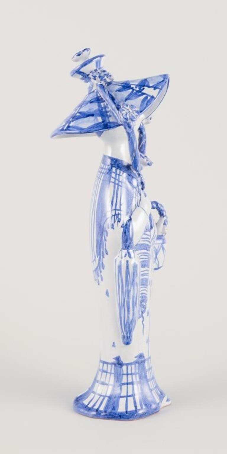 Scandinavian Modern Bjørn Wiinblad. “Autumn” figure in blue glazed earthenware. Dated 1968 For Sale