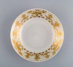 Bjrn Wiinblad für Rosenthal, 10 tiefe Teller aus Porzellan mit Golddekor
