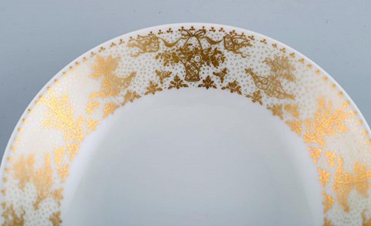 German Bjørn Wiinblad for Rosenthal, 10 Deep Plates in Porcelain with Gold Decoration