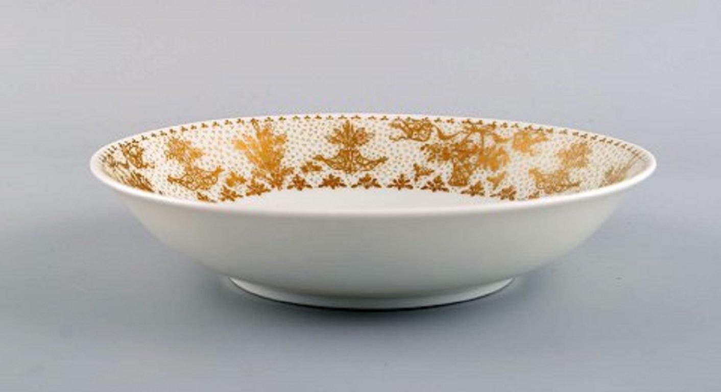 Late 20th Century Bjørn Wiinblad for Rosenthal, 10 Deep Plates in Porcelain with Gold Decoration