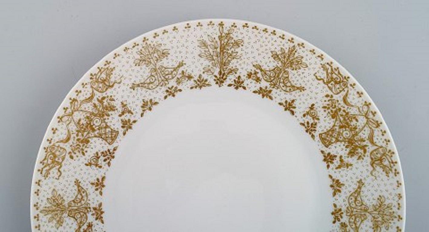 German Bjørn Wiinblad for Rosenthal, 10 Plates in Porcelain with Gold Decoration, 1980s For Sale
