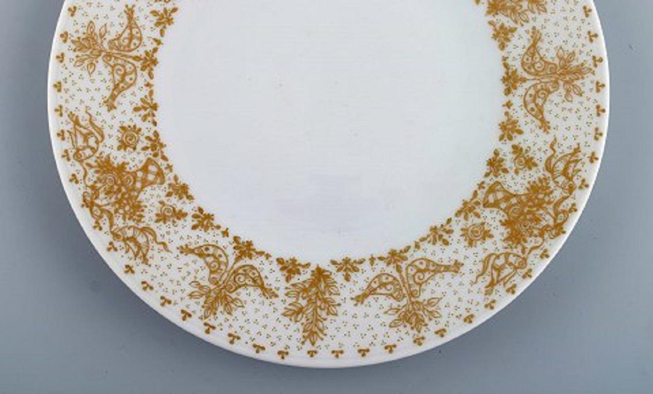 Huit assiettes en porcelaine décorées d'or Bjrn Wiinblad pour Rosenthal Excellent état à København, Copenhagen