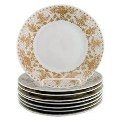 Bjørn Wiinblad for Rosenthal, Eight Plates in Porcelain with Gold Decoration