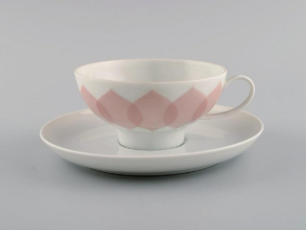 Bjørn Wiinblad for Rosenthal. Lotus porcelain service. 
9 teacups with saucers decorated with pink lotus leaves. 1980s.
The cup measures: 10 x 5 cm.
Saucer diameter: 15 cm.
In excellent condition.
Stamped.