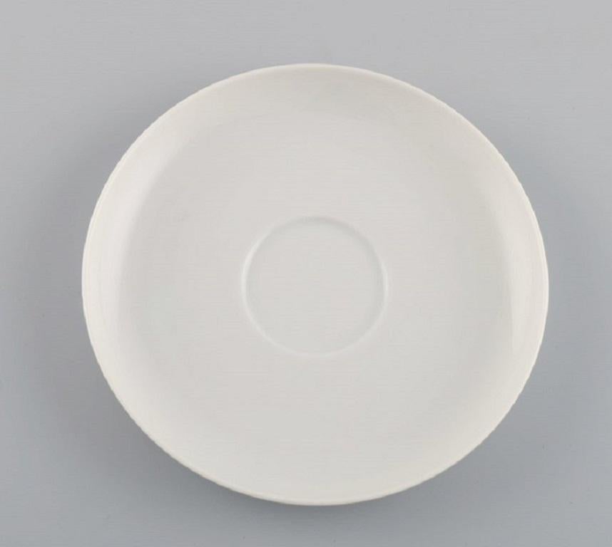 German Bjørn Wiinblad for Rosenthal, Lotus Porcelain Service, 9 Teacups with Saucers For Sale