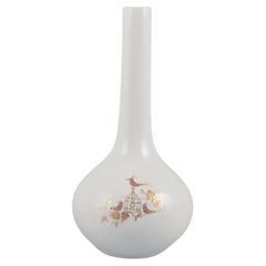 Bjørn Wiinblad for Rosenthal. Narrow-necked vase in porcelain.