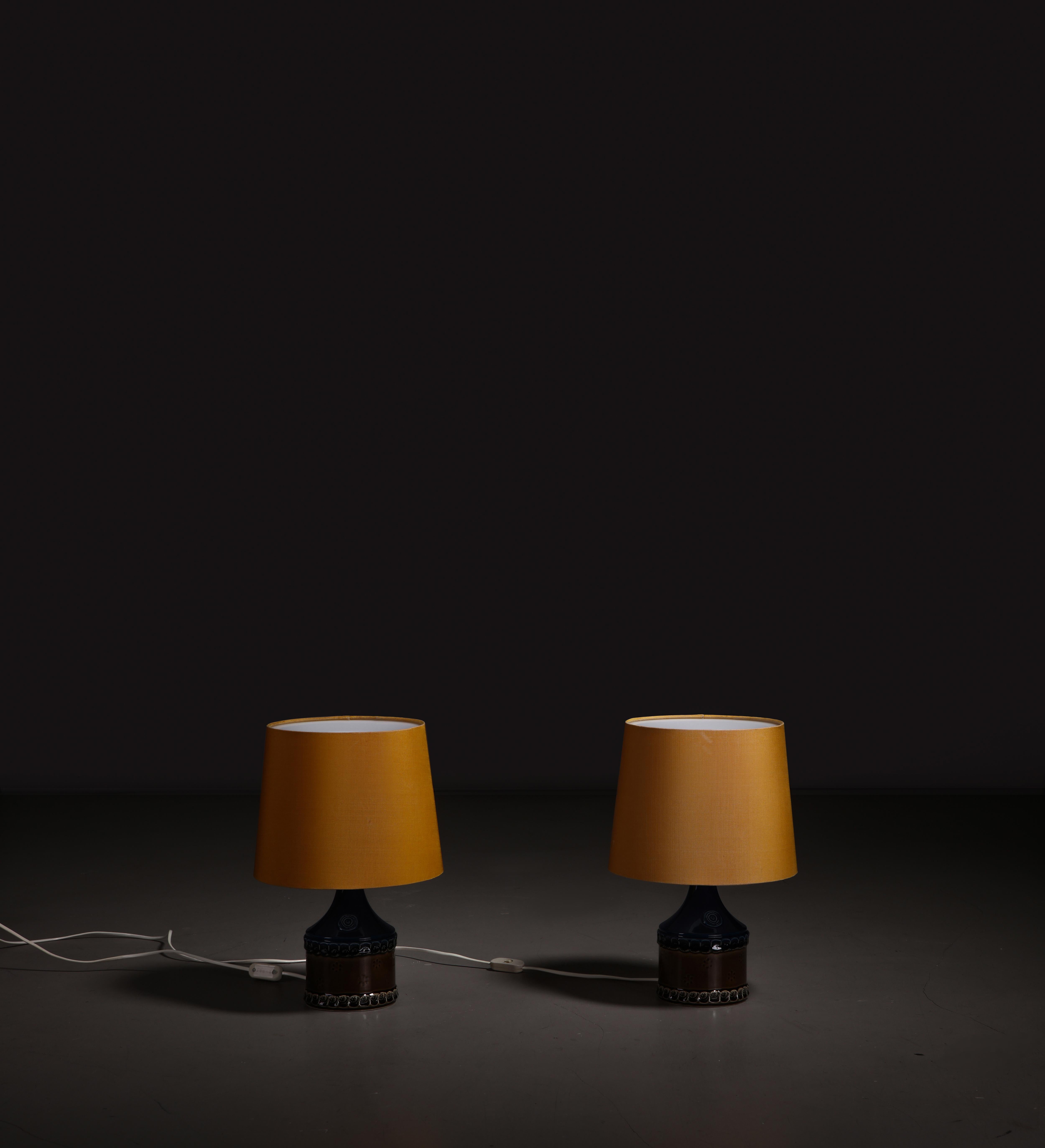 Pair of porcelain table lamps designed by Bjørn Wiinblad and manufactured by Rosenthal, Germany, 1960s.

This pair of rare porcelain table lamps is a true testament to the timeless elegance of mid-century design. Manufactured by Rosenthal in the