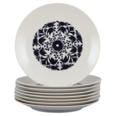 Bjørn Wiinblad pour Rosenthal. Ensemble de huit assiettes Hilton d'Berlin en porcelaine.