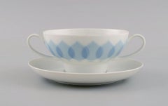 Bjørn Wiinblad for Rosenthal, Twelve Lotus Porcelain Bouillon Cups with Saucers