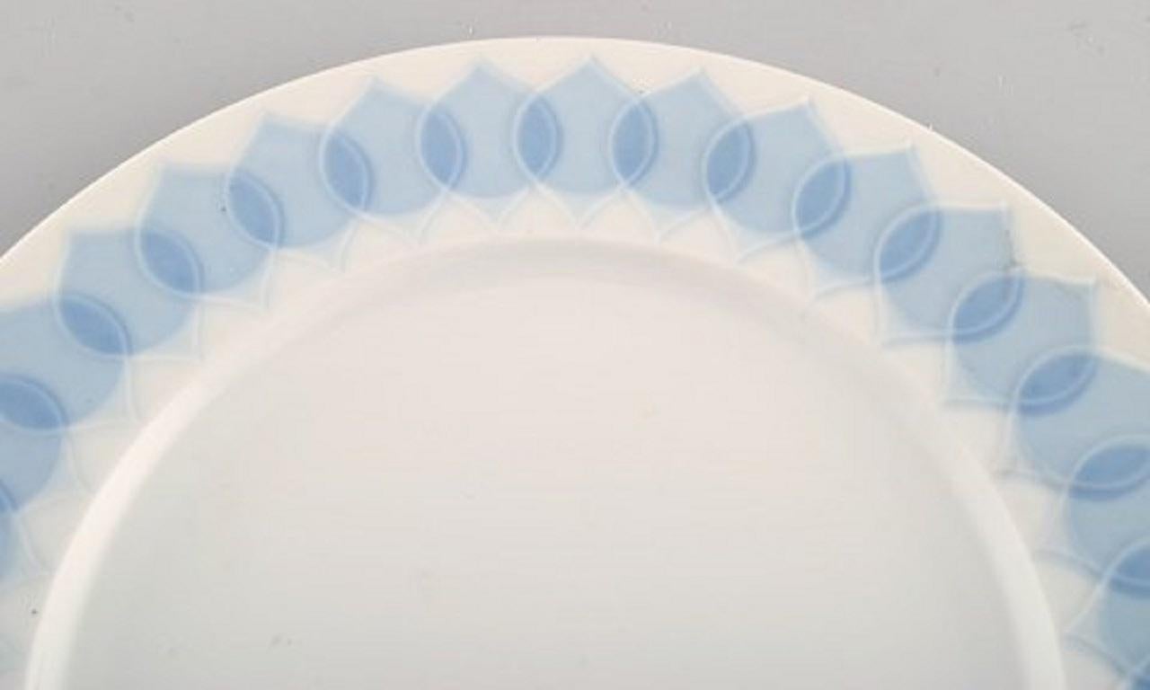 Modern Bjørn Wiinblad for Rosenthal, Twelve Lotus Porcelain Dinner Plates