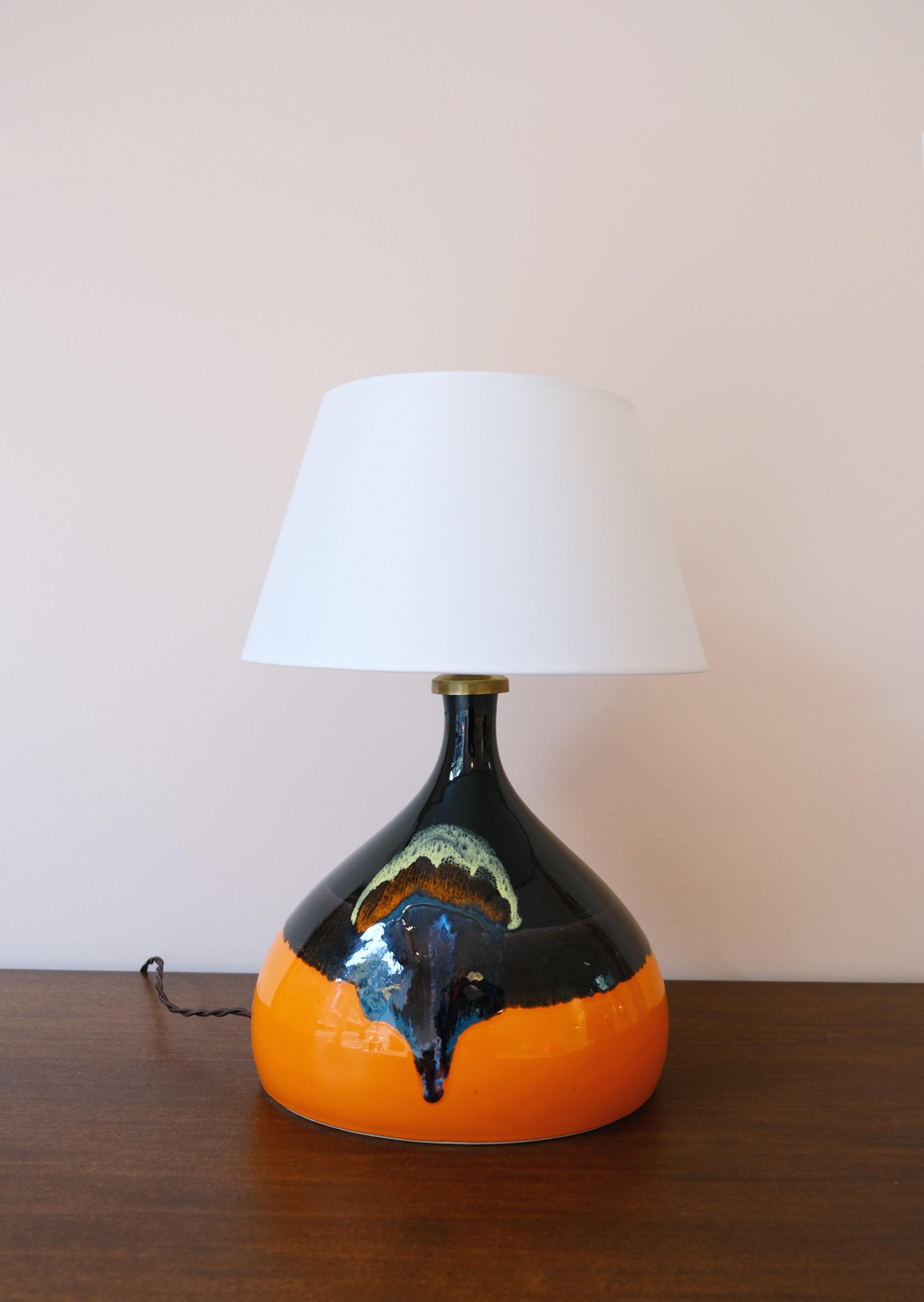 Unique, glazed ceramic lamp by Danish painter, designer, stage designer and visual artist, Bjørn Wiinblad. 

Bjørn Wiinblad (1918–2006) was a Danish artist and designer celebrated for his whimsical, richly detailed style that stood apart from the